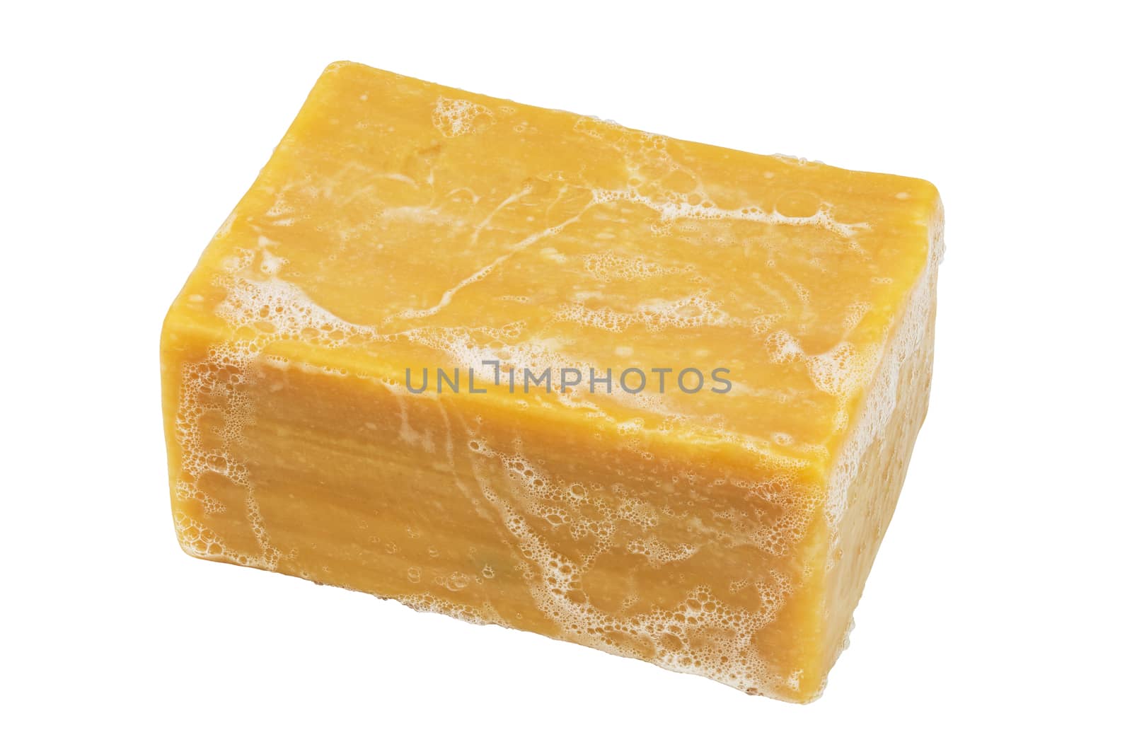 piece of wet laundry soap and sud isolated on white background in diagonal perspective