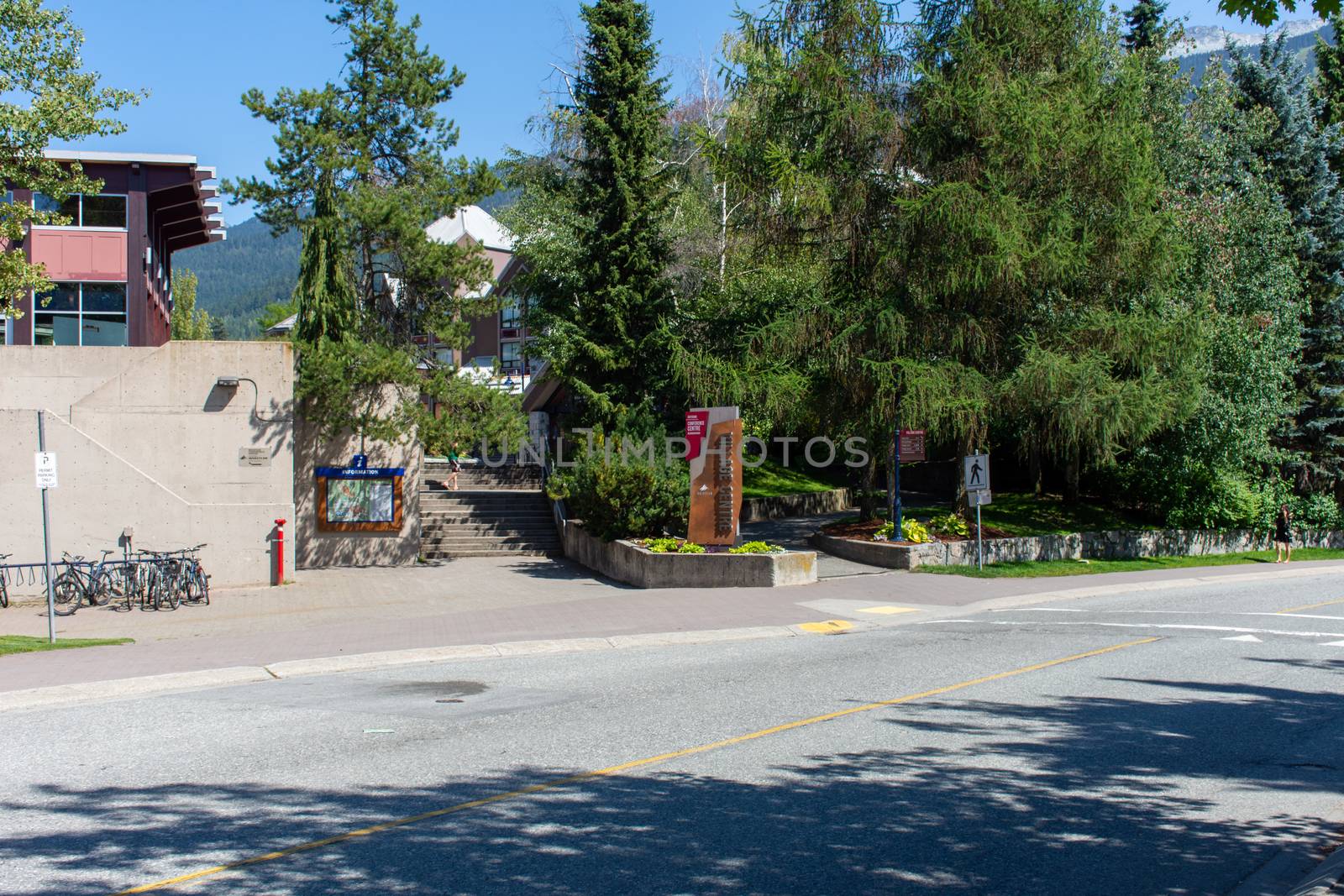 "Whistler, British Columbia/Canada - 08/07/2019: Whistler village streets during the summer looking at the walkway, street, shops and tourists enjoying this Olympic world class destination."