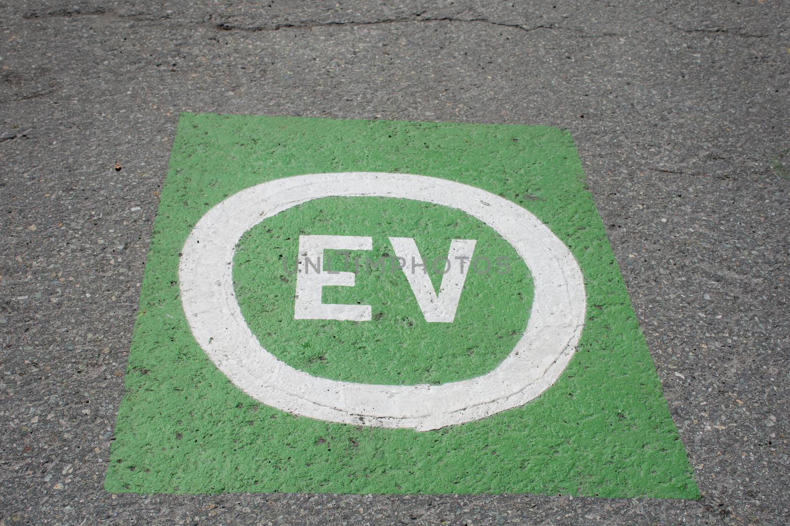 Electric vehicle green parking place for e-cars saving the envir by kingmaphotos