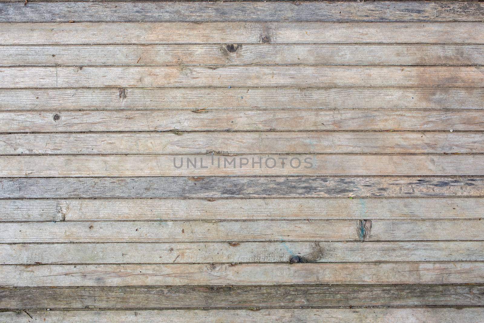 flat texture and background of horizontal gray thin solid wooden planks - old, and worn out