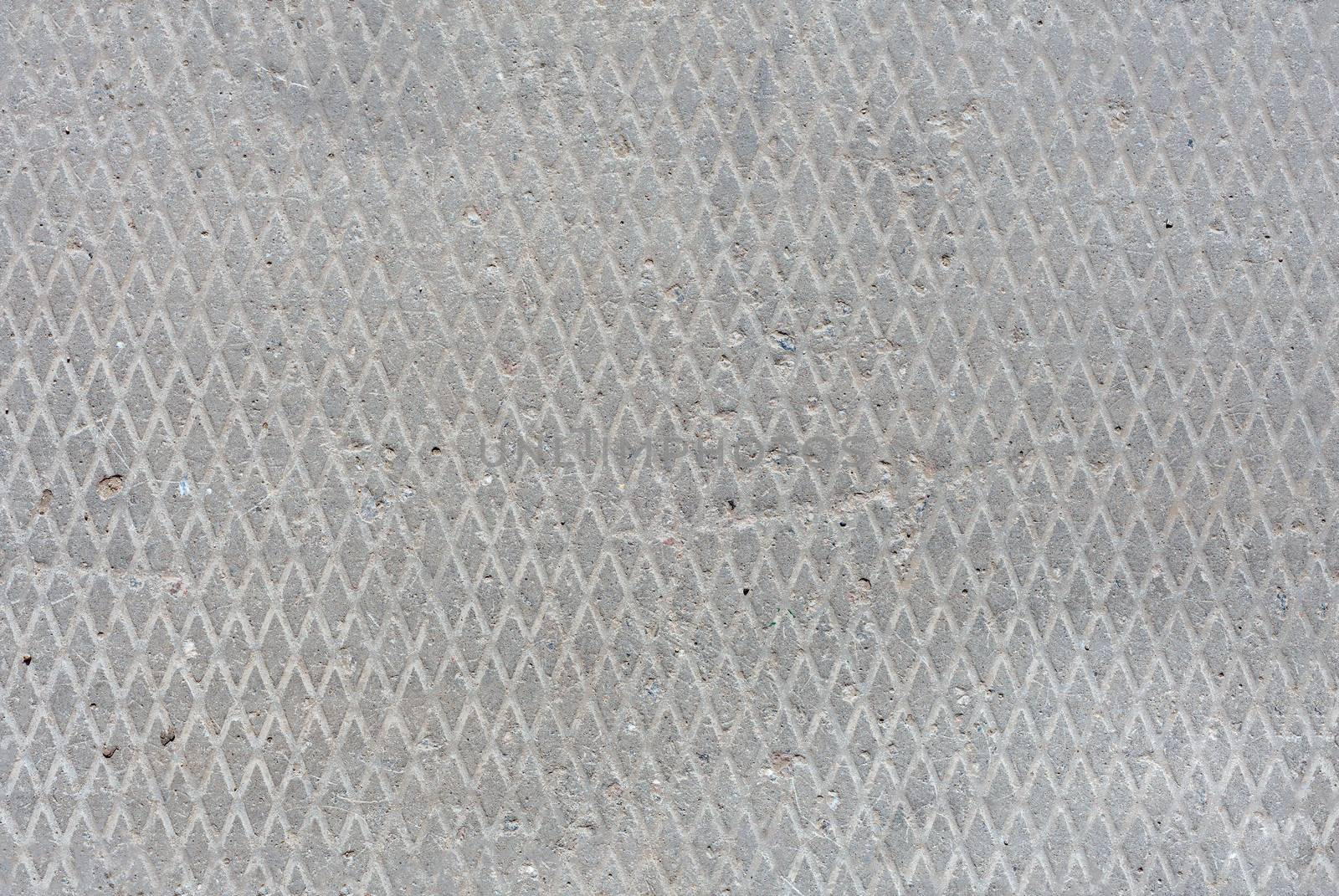 seamless old flat concrete texture with diamond pattern and signs of light erosion.