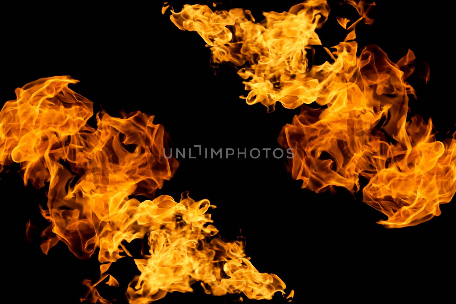 Fire on black background. Fiery patterns. Burning flame. Blazing fire. Flaming patterns and abstract smoke. Concept, idea, project. 