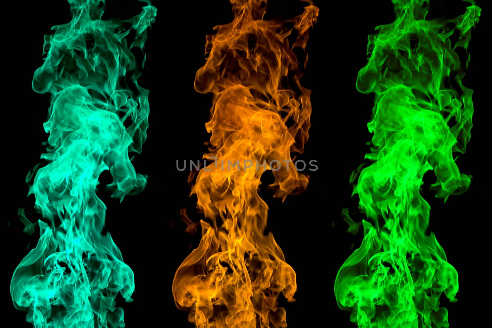 Colored fire on black background. Flaming patterns and abstract smoke. Concept, idea, project.