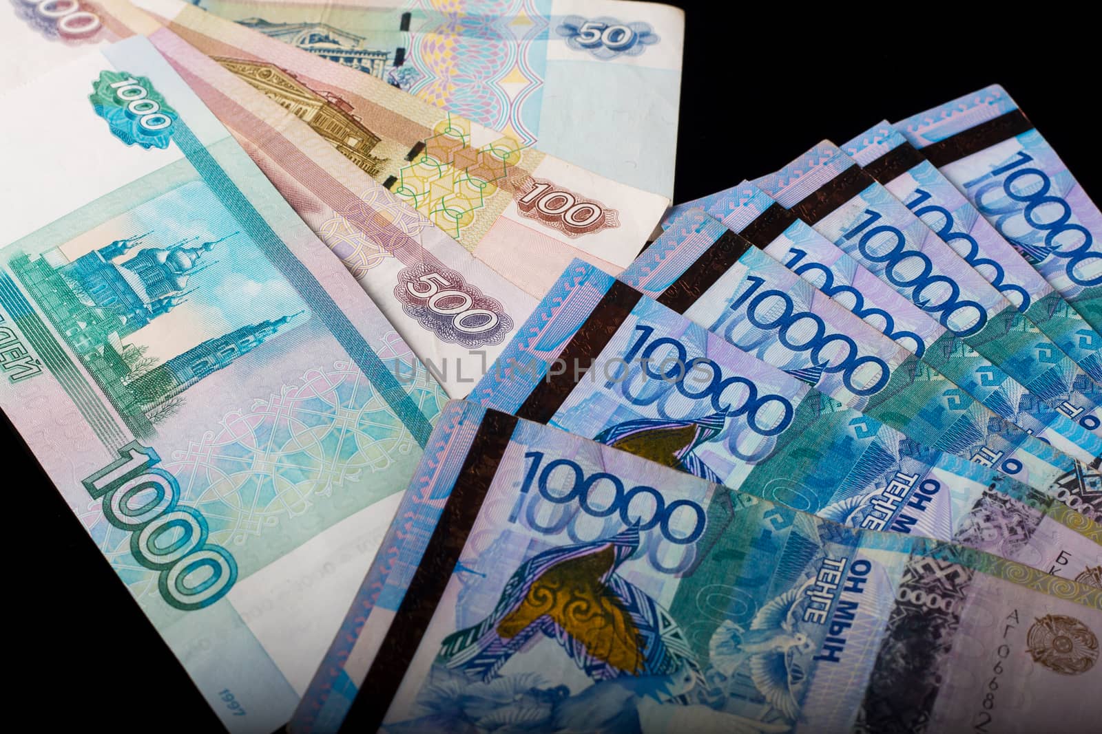 Tenge, Kazakhstan and the Russian ruble. Exchange rate. Bank, world economy, crisis, Finance. Dollar rate. Banknotes of different countries. Eurasian economic Union