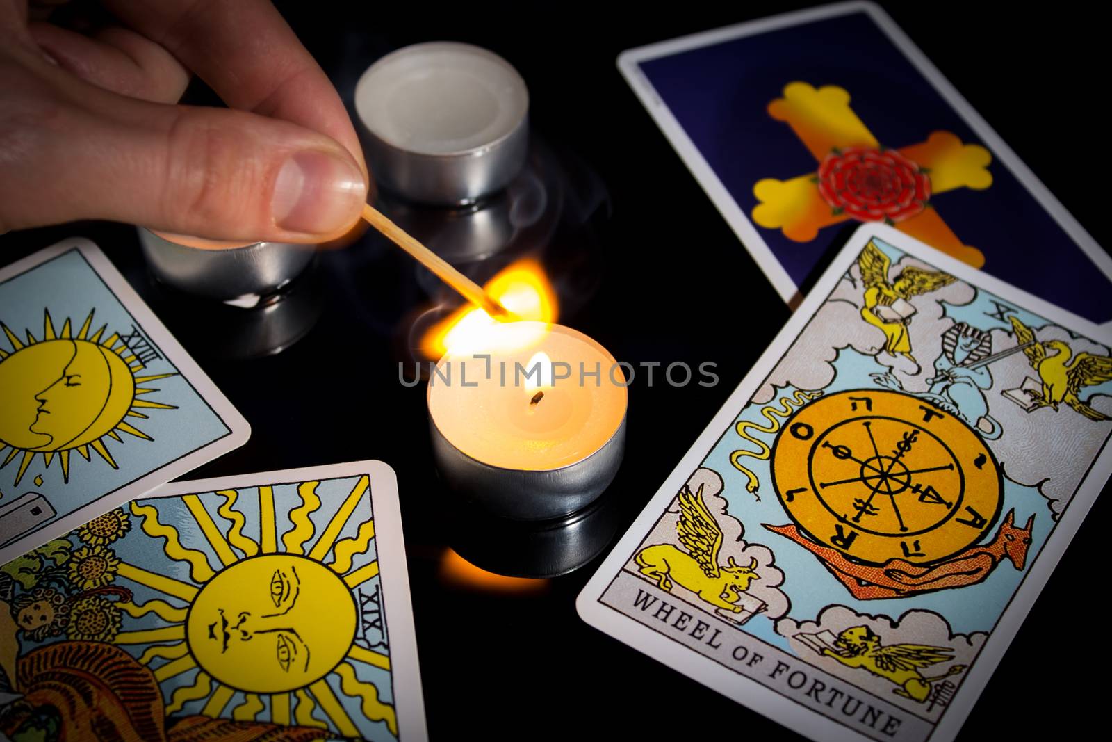 Tarot card reading. Christmas divination, ritual, rite. Magical crystal, candle. Predicting the future. Love spell. Witchcraft, magic.