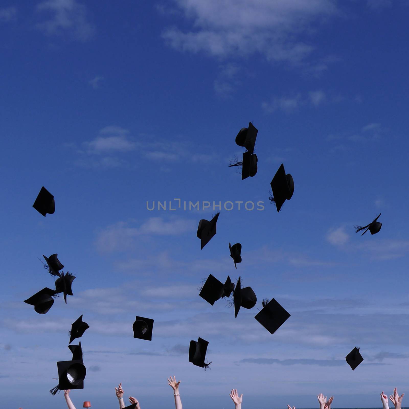 University students celebrating the award of their degrees on their graduation day