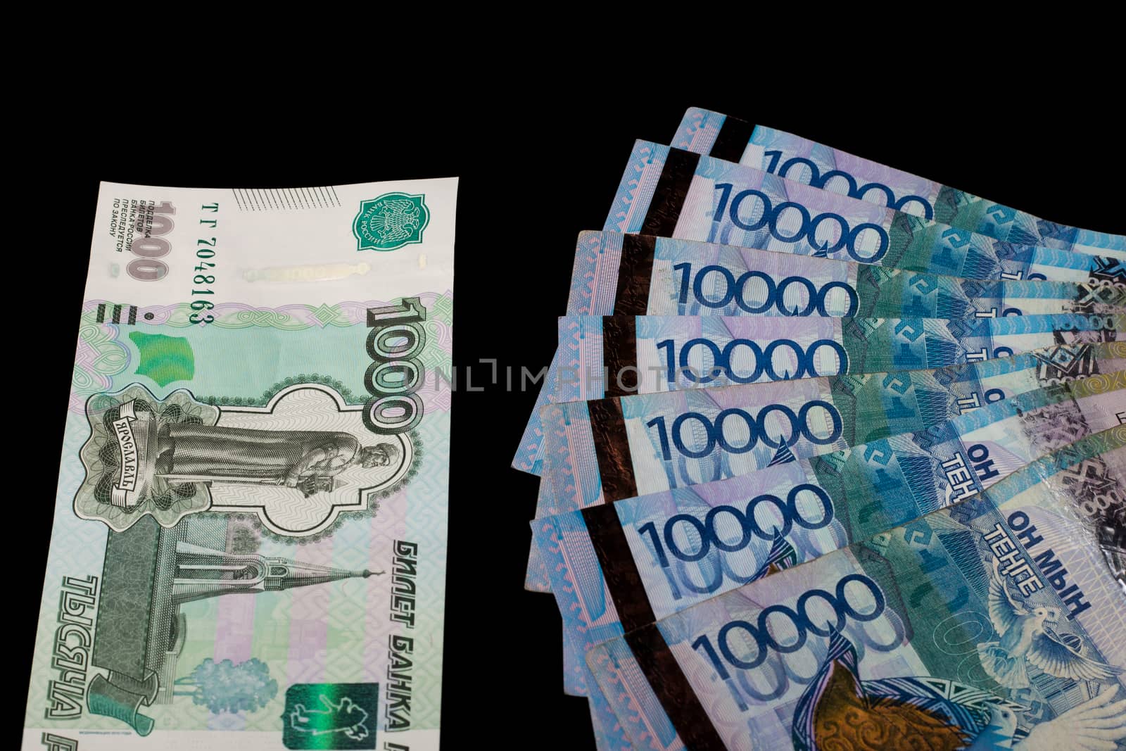 Tenge, Kazakhstan and the Russian ruble. Exchange rate. Bank, world economy, crisis, Finance. Dollar rate. Banknotes of different countries. Eurasian economic Union
