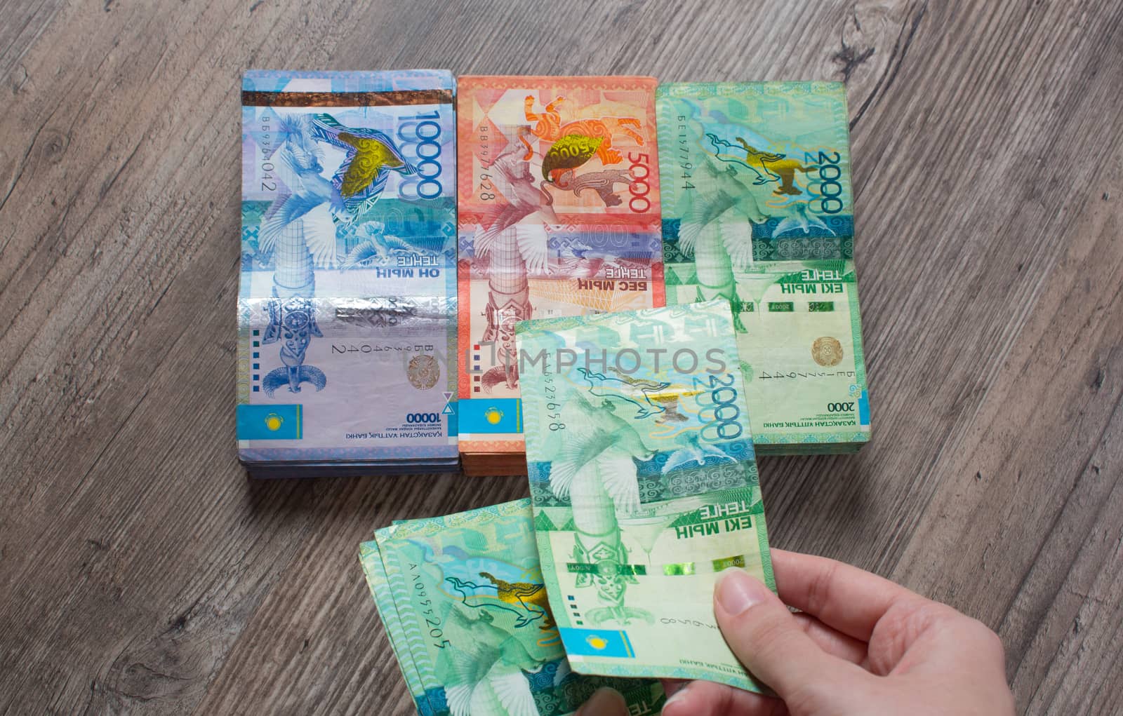 Hands hold a lot of money. Tenge KZT. National currency of Kazakhstan, KZ. Exchange rate. Economy, development, business, Bank, broker. Banknote	