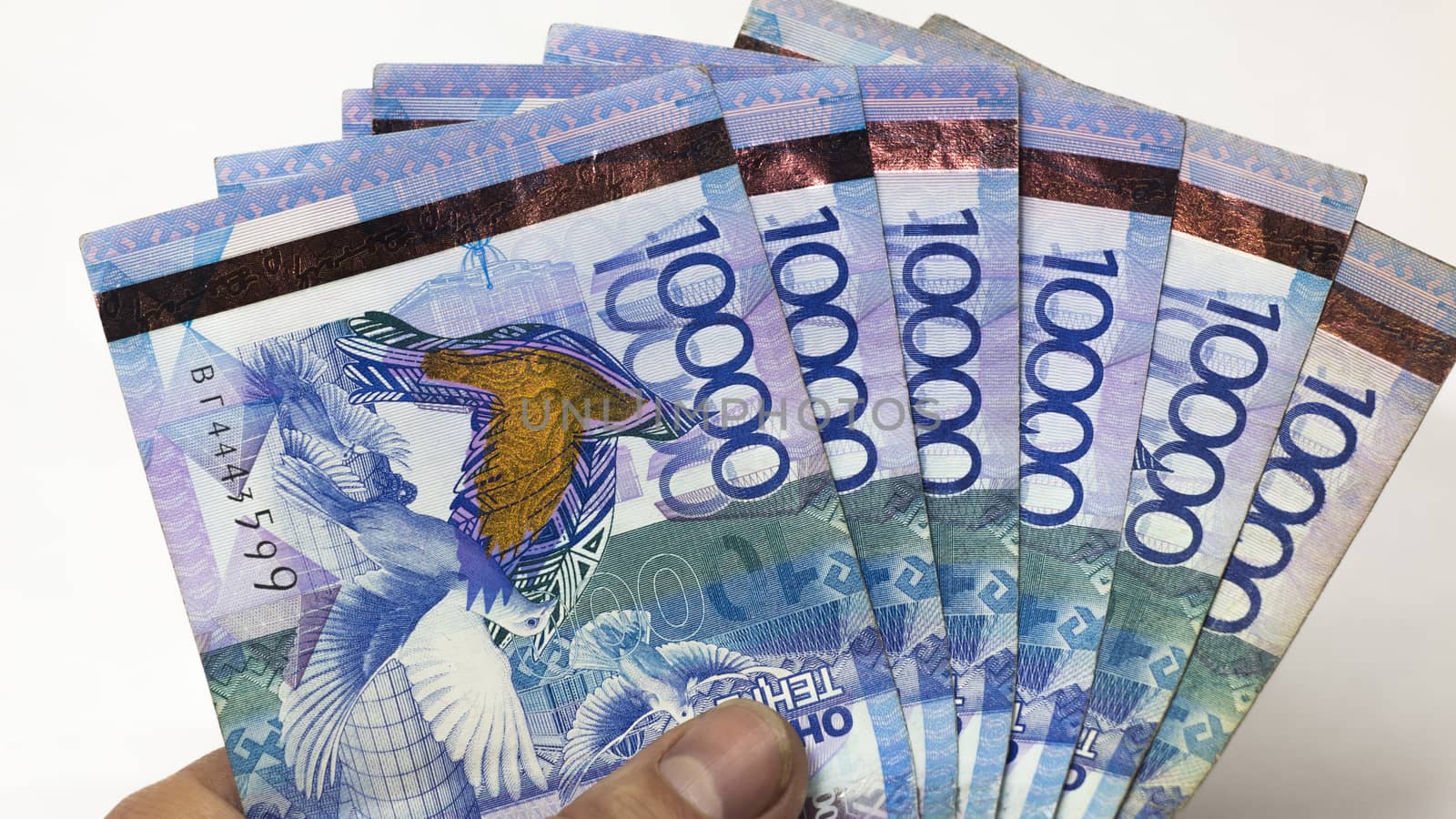 Inflation or devaluation in Kazakhstan.Issuance of mortgages,loans,credits.Paper money tenge.Bundle of money.Banknotes tenge.Wages of workers in Kazakhstan.Salary increases,pensions,social benefits.