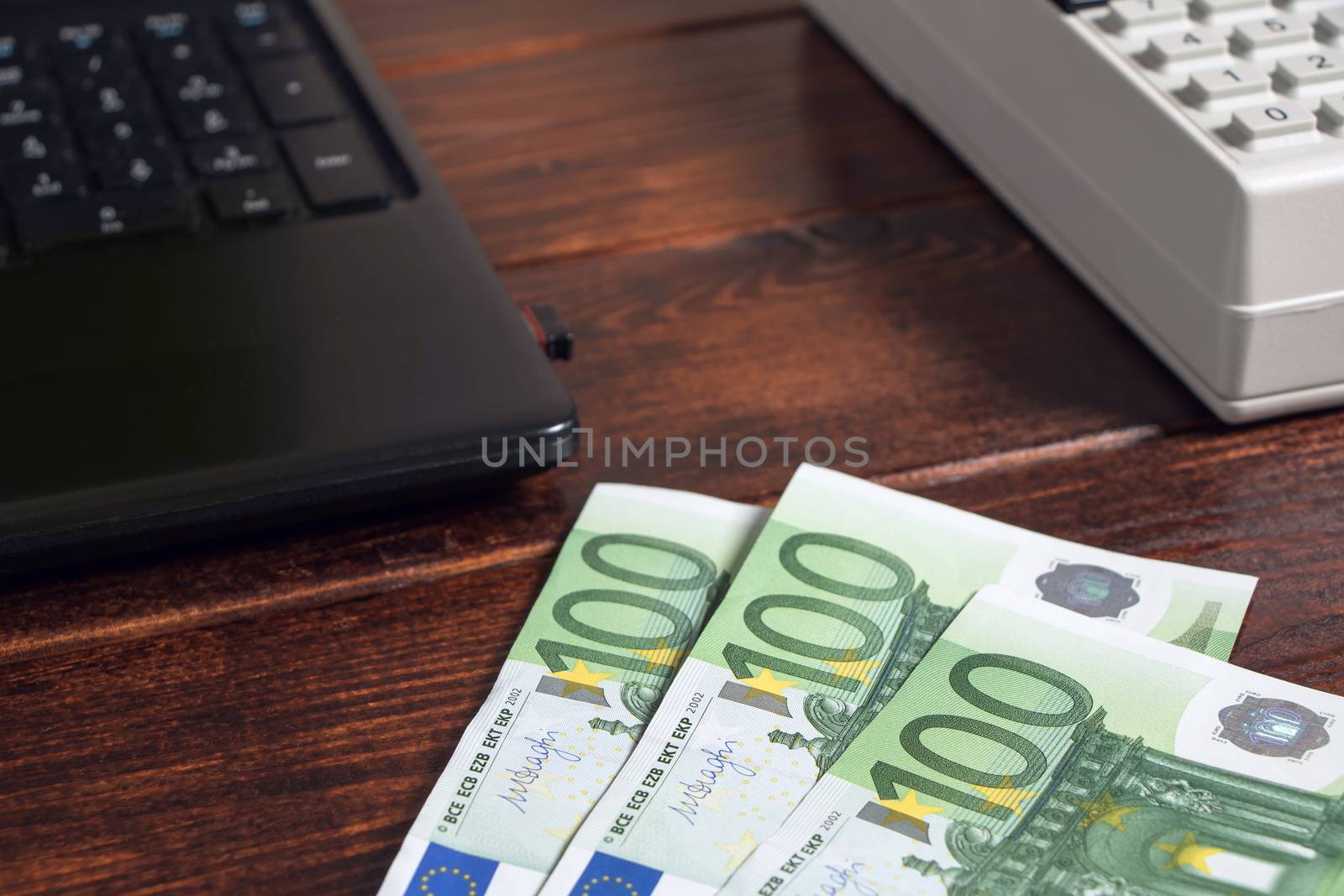 Money Euro are on documents, accounts or mortgages in the office on the table. Work in the office with finances, documents, invoices,mortgages or pay salary