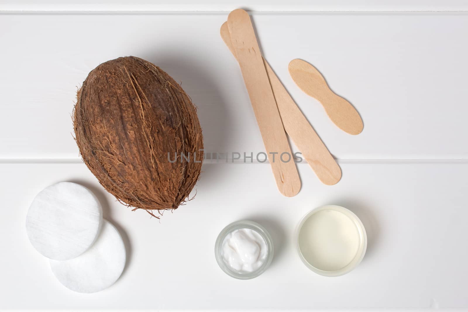 Natural organic cosmetics. Coconut, oil, cream, moisturizing. Spa, beauty Salon, skin care. Eco cosmetic. Healthy lifestyle. Still life. Handmade. Top view, flat lay, concept.