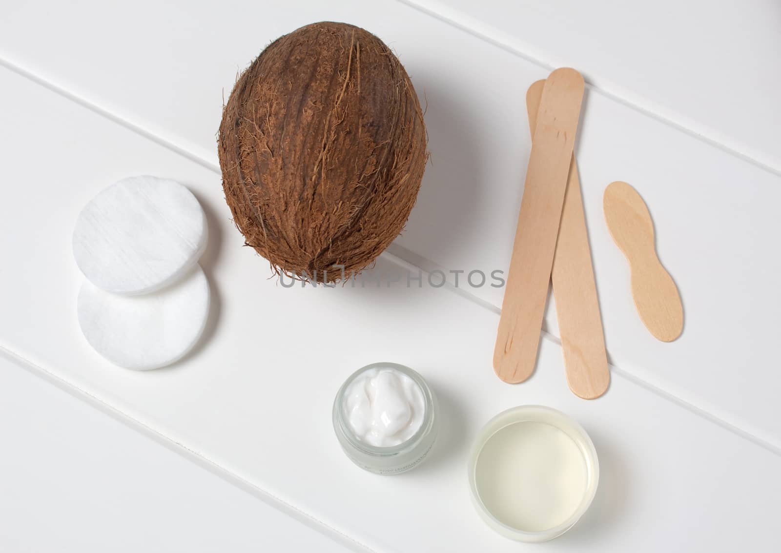 Natural organic cosmetics. Coconut, oil, cream, moisturizing. Spa, beauty Salon, skin care. Eco cosmetic. Healthy lifestyle. Still life. Handmade. Top view, flat lay, concept.