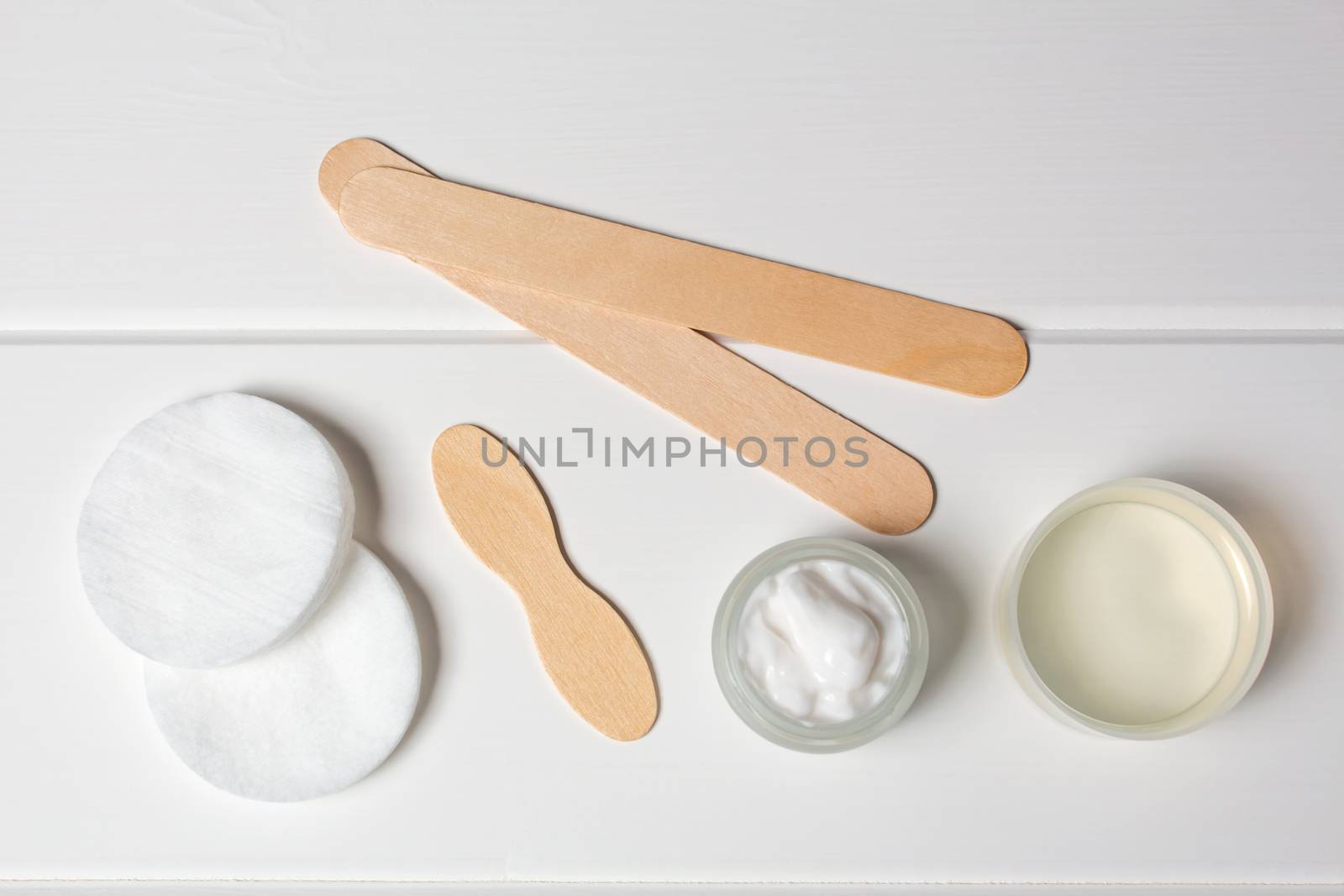 Natural organic cosmetics. Oil, cream, moisturizing, spatula, cotton pads. Spa, beauty Salon, skin care. Eco cosmetic. Healthy lifestyle. Still life. Handmade. Top view, flat lay, concept.