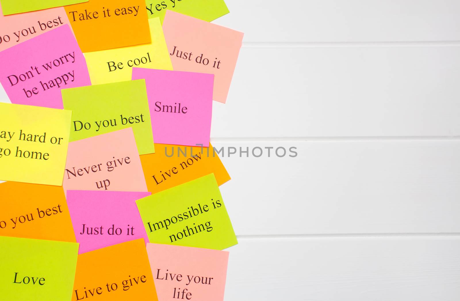 Motivational words on colorful stickers on white background. A vision Board. Copy space. Cards with words. Affirmation, development, training, seminar. Plan, strategy, concept. Creativity