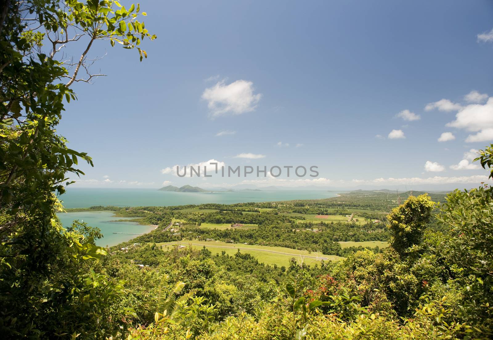 View over the coast and Mission Beach, Australia by stockarch