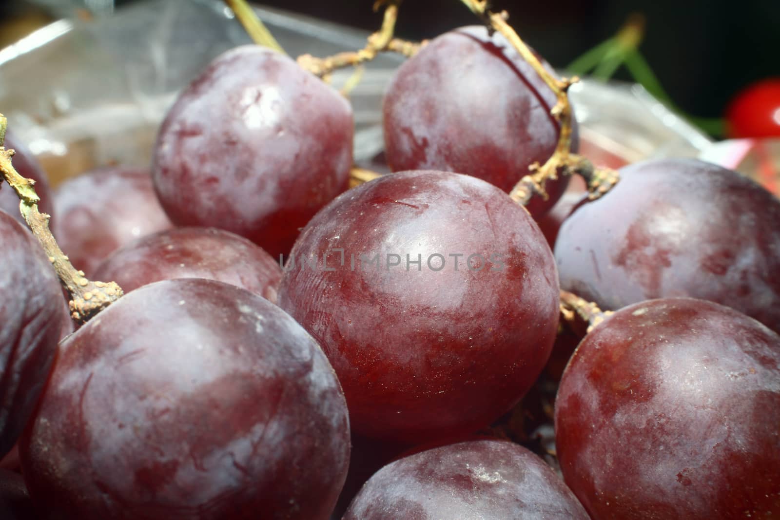 fresh red grape in plate, macro close up