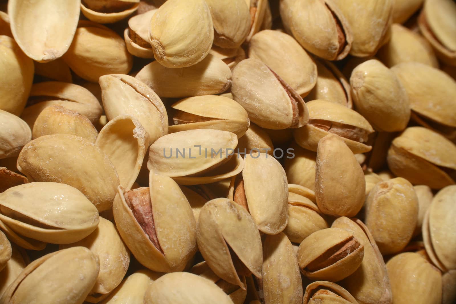 pistachios roasted in market, macro close up