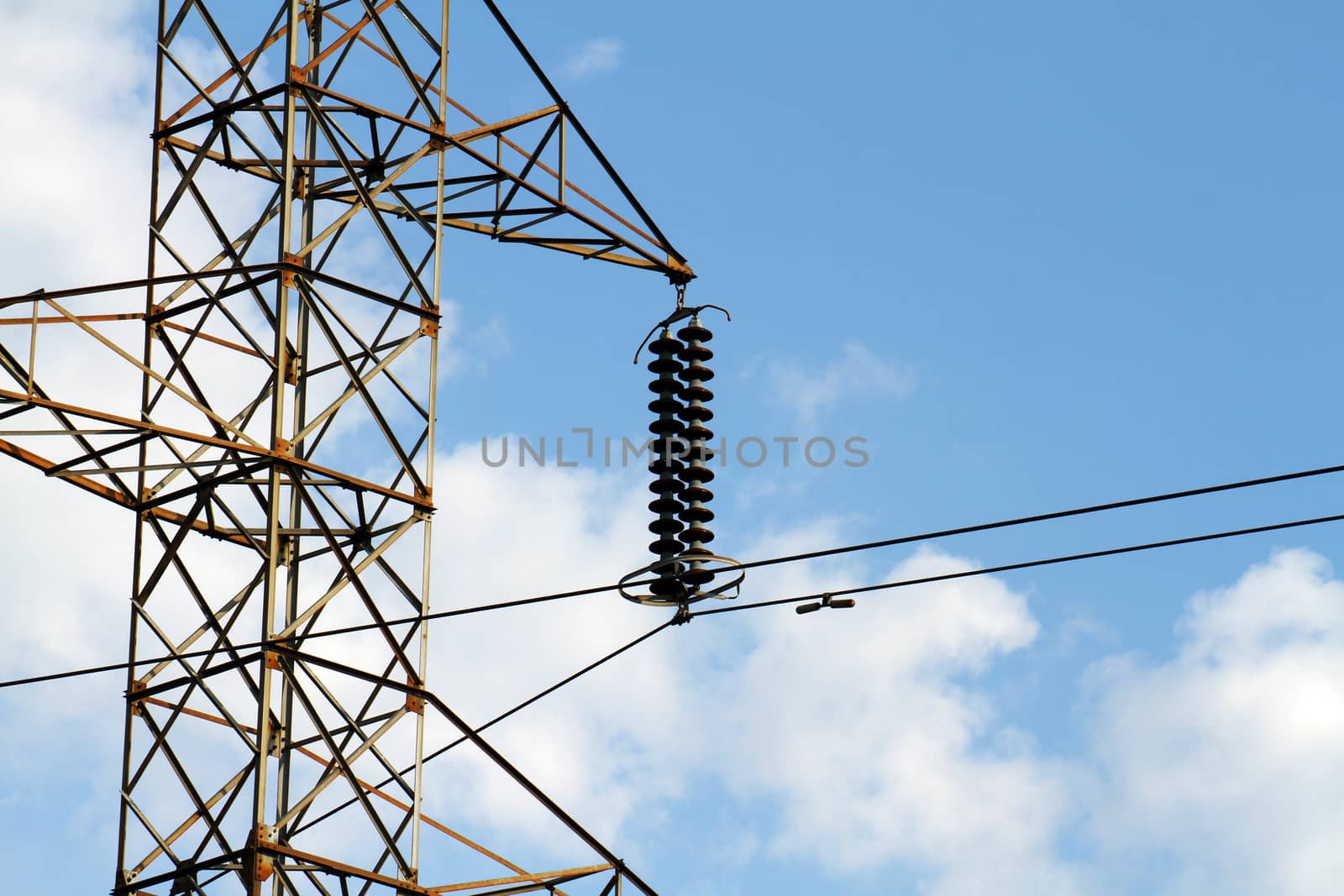 Power lines transmission line blue sky with clouds