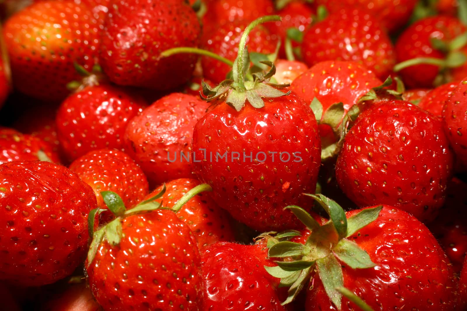 red organic strawberries fruit, macro close up