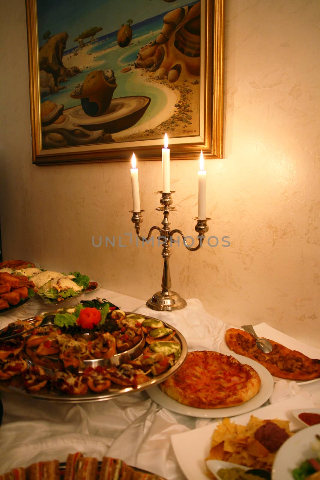 candlestick and table with food, retro stile