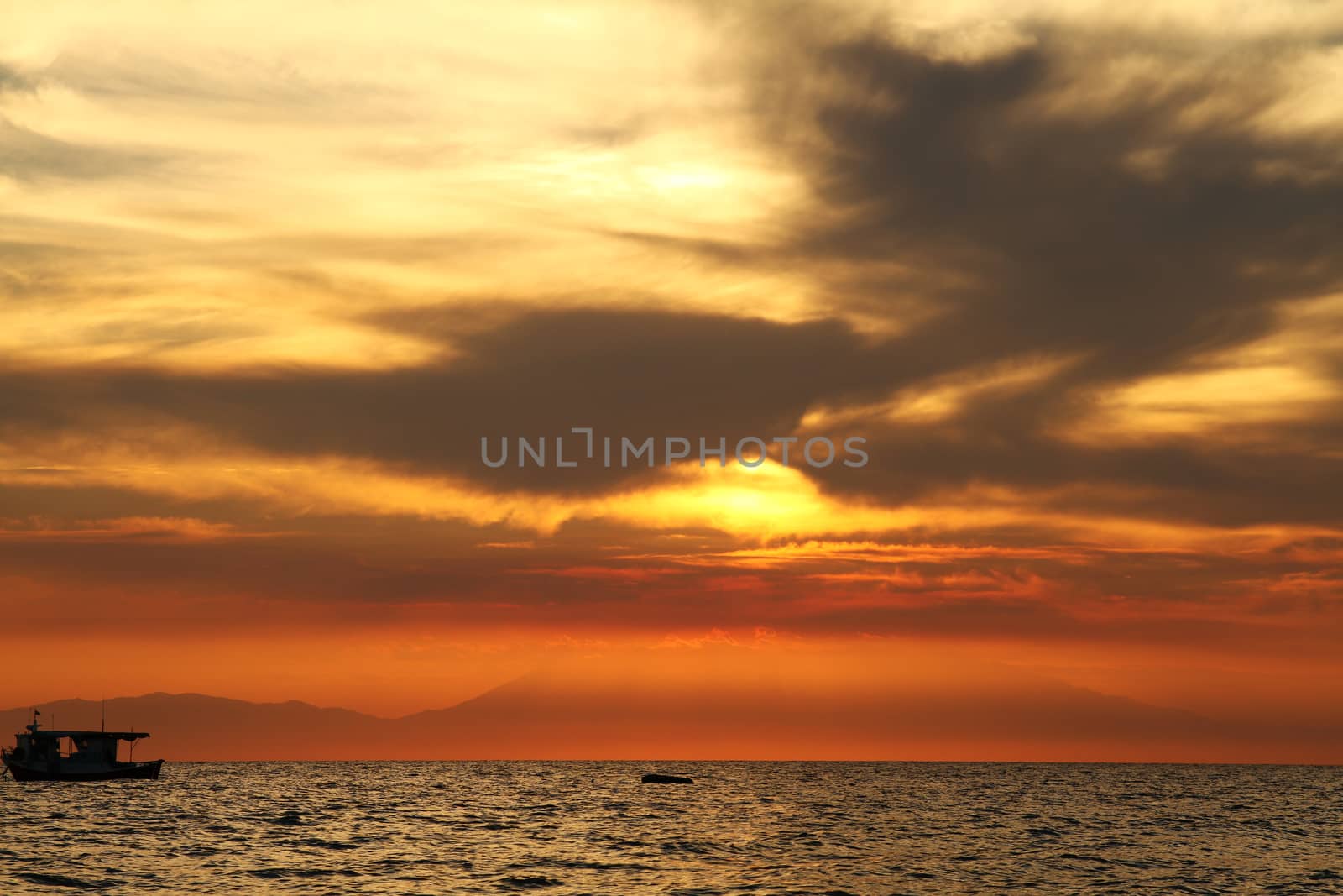 Red purple orange sunset over sea, beautiful cloud space