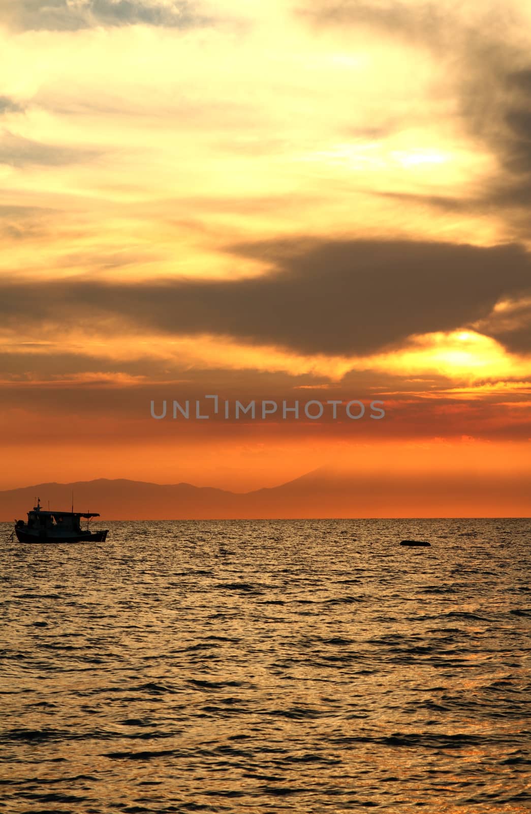 Red purple orange sunset over sea by alex_nako