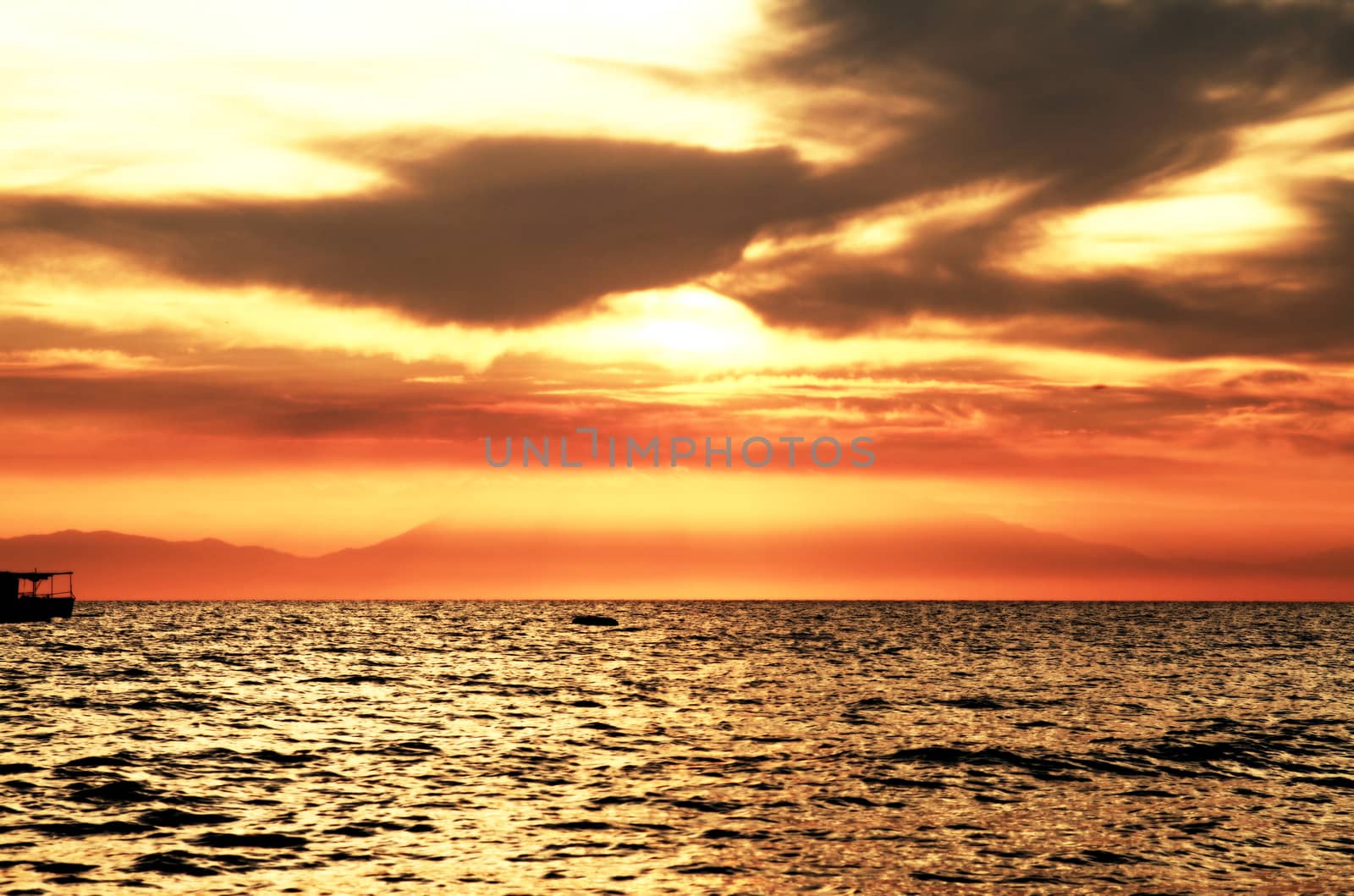 Red purple orange sunset over sea by alex_nako