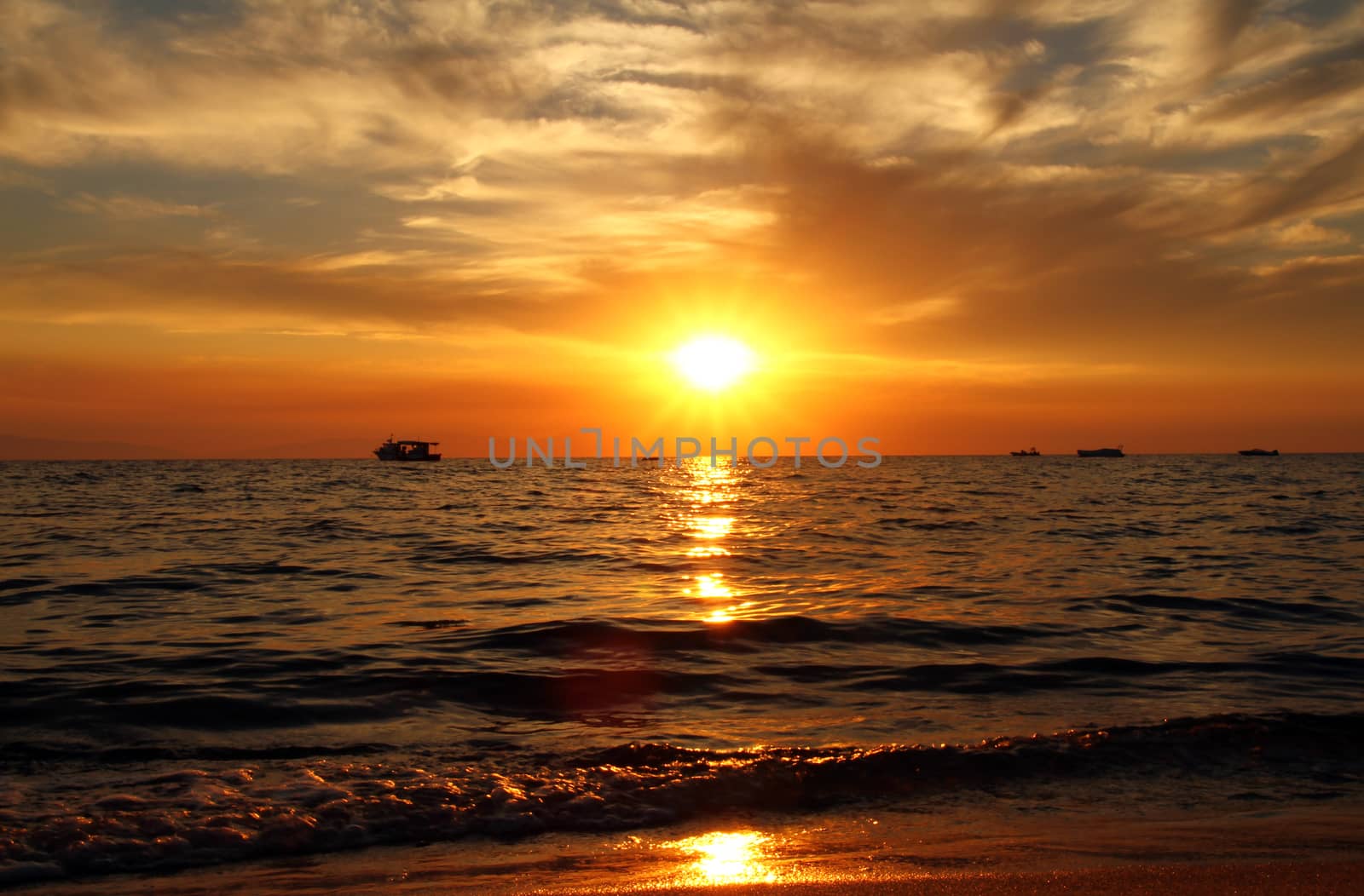 Red purple orange sunset over sea, beautiful cloud space