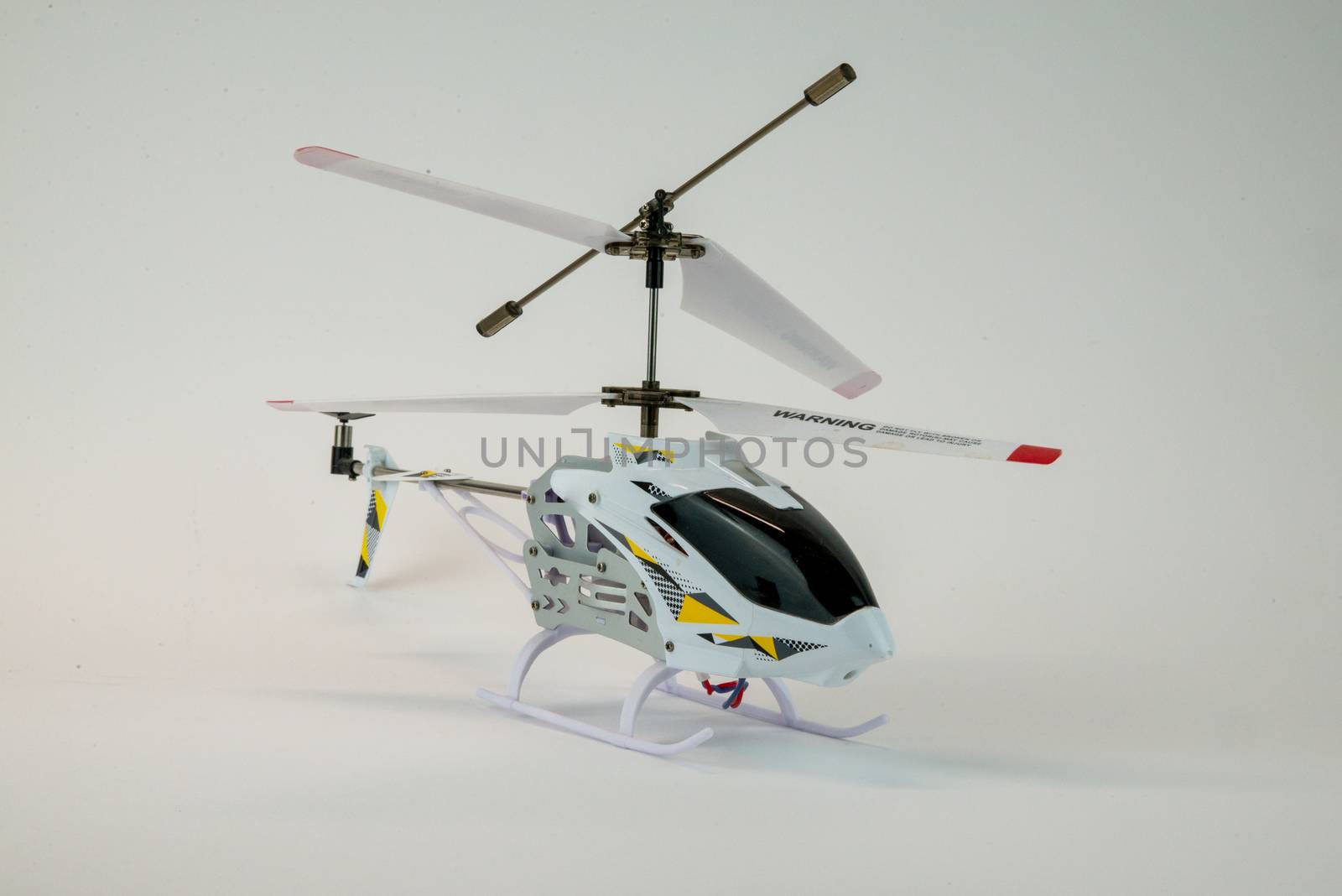 white propeller electric helicopter model