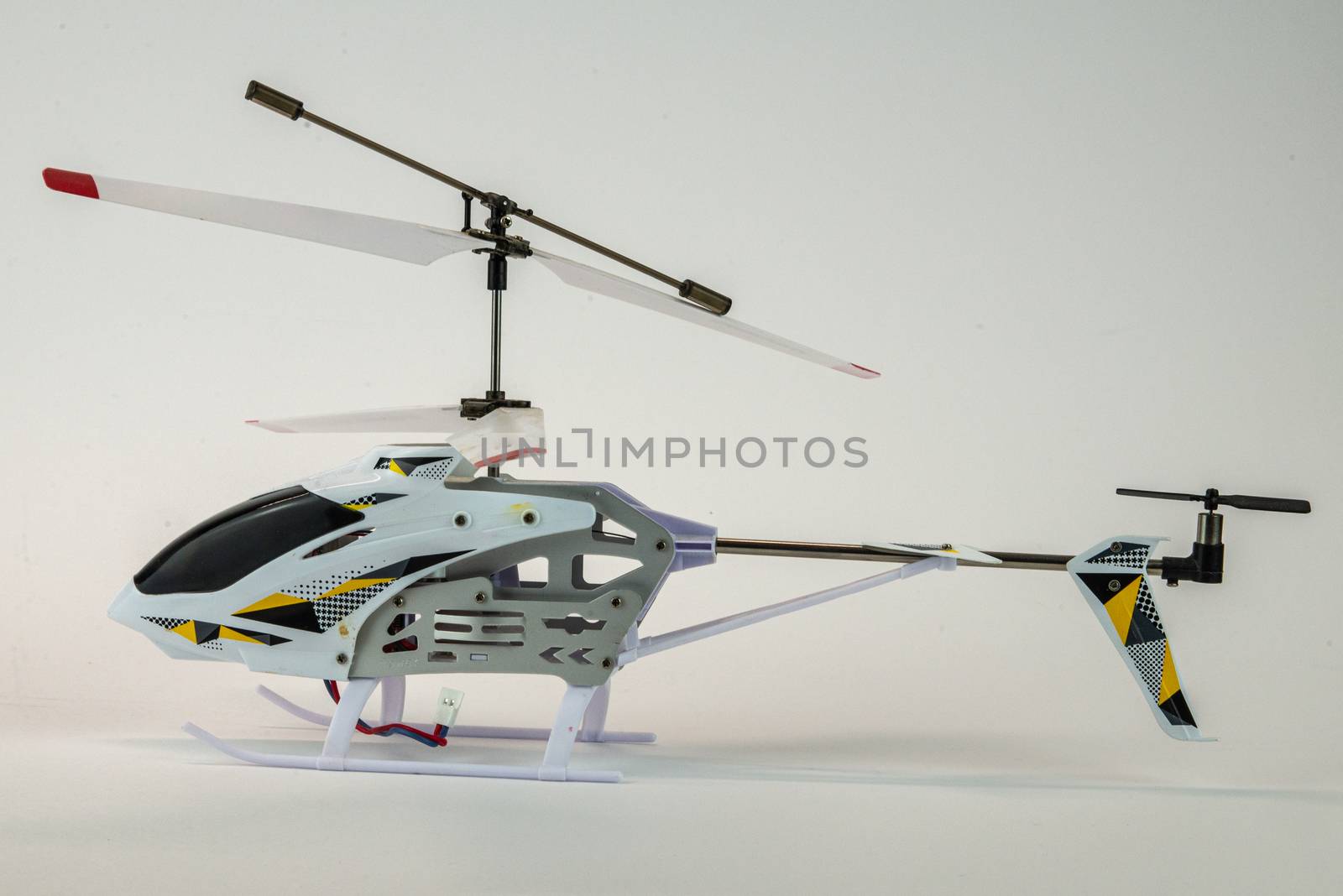 white electric helicopter model by carfedeph