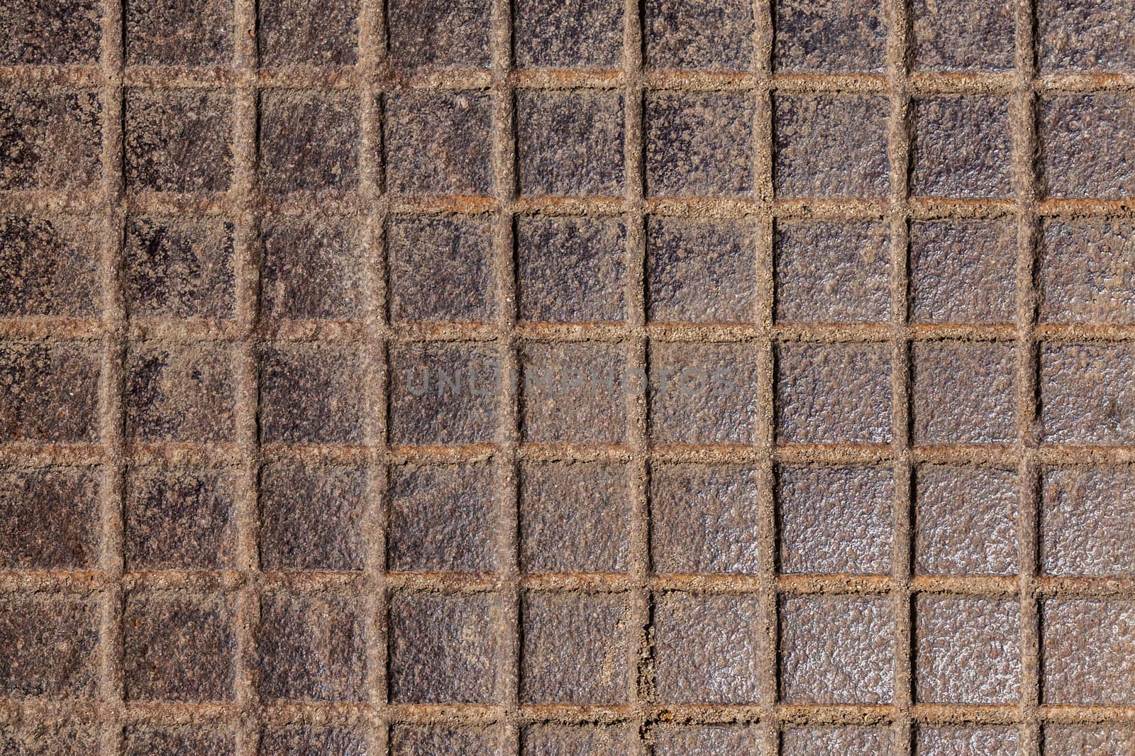 square notches cast iron rusted floor background