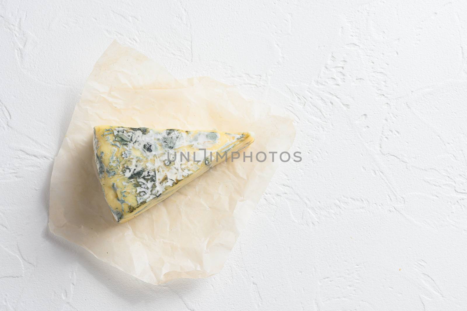 Dor Blue molded cheese france cheese on slate background. Concept top view space for text.