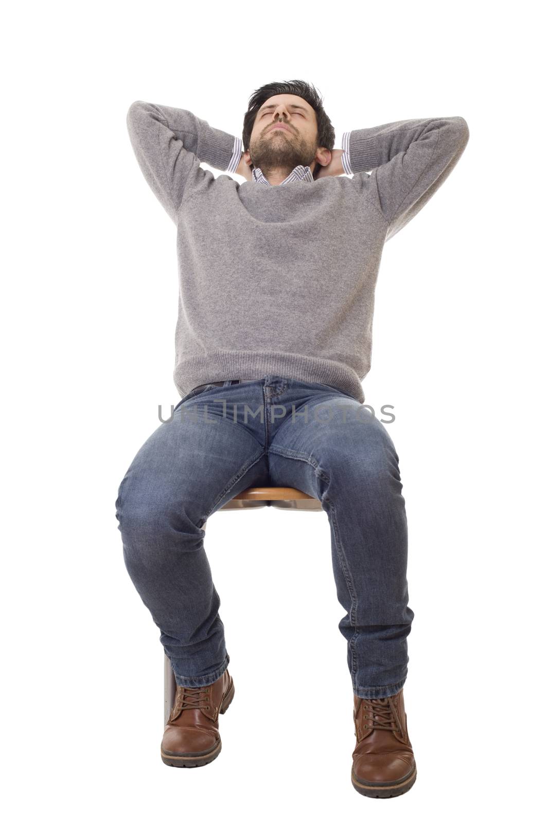 casual man sleeping on a chair, isolated on white background