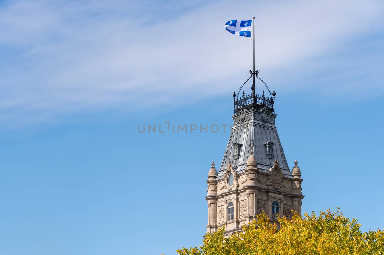 Quebec Flag at the top of the Quebec Parliament building in Quebec City.