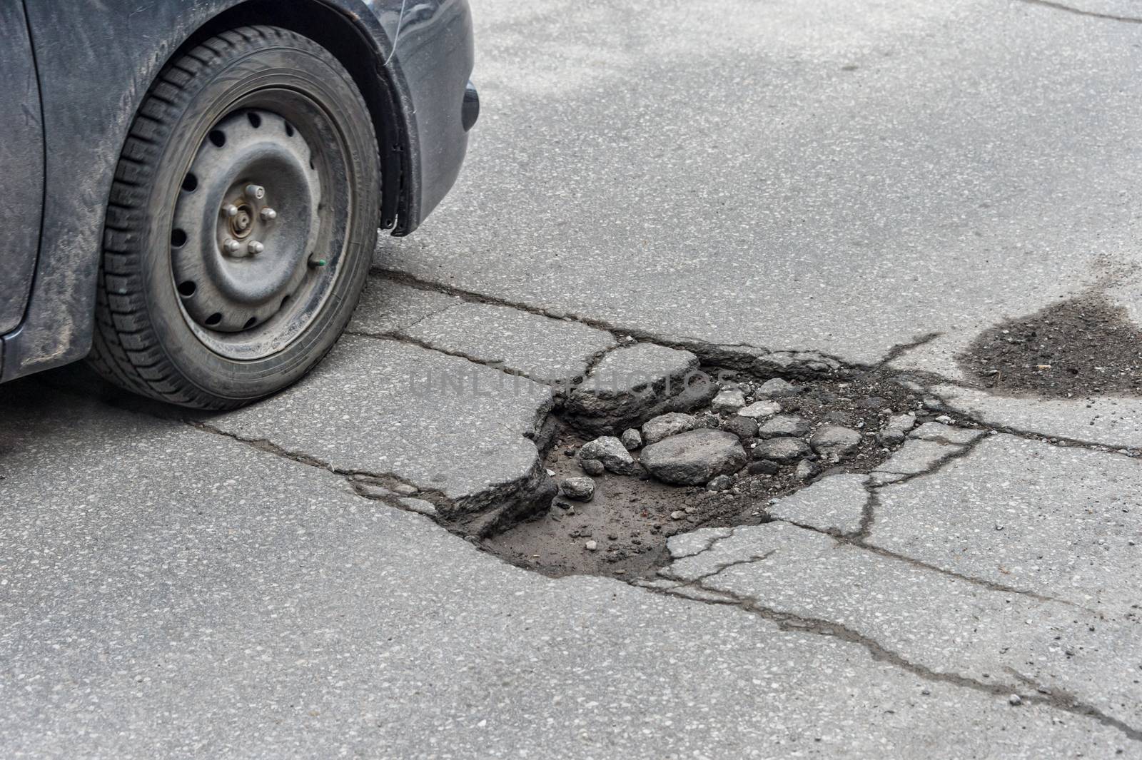 Large pothole in Montreal, Canada.
