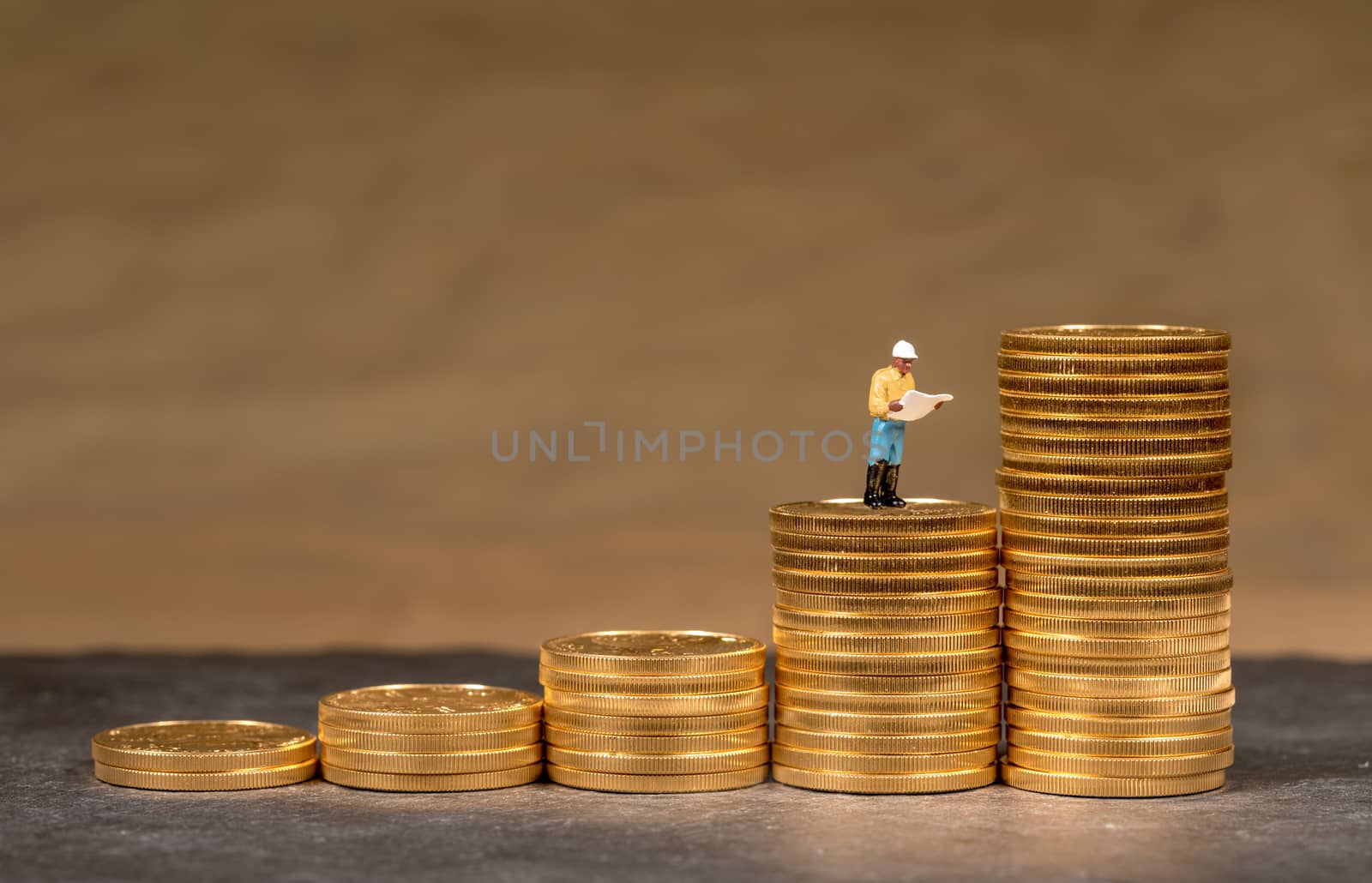 Concept illustration of growth chart for gold using US Treasury golden coins