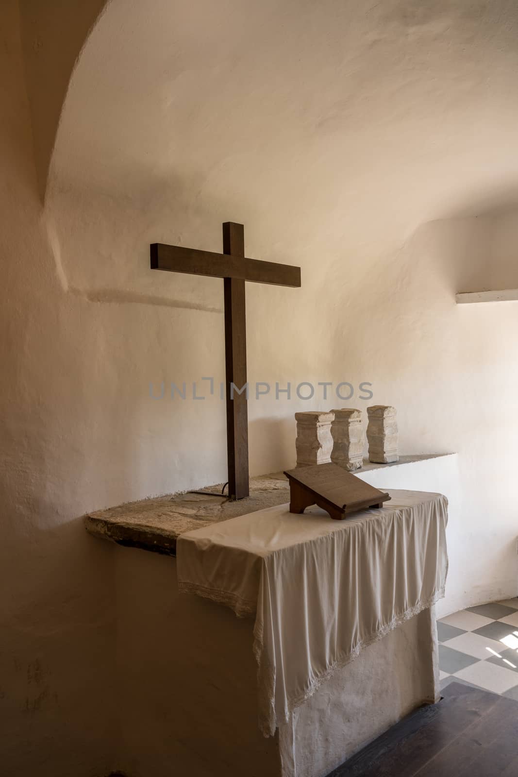 Plain church altar in Predjama castle built into a cave in Slovenia by steheap