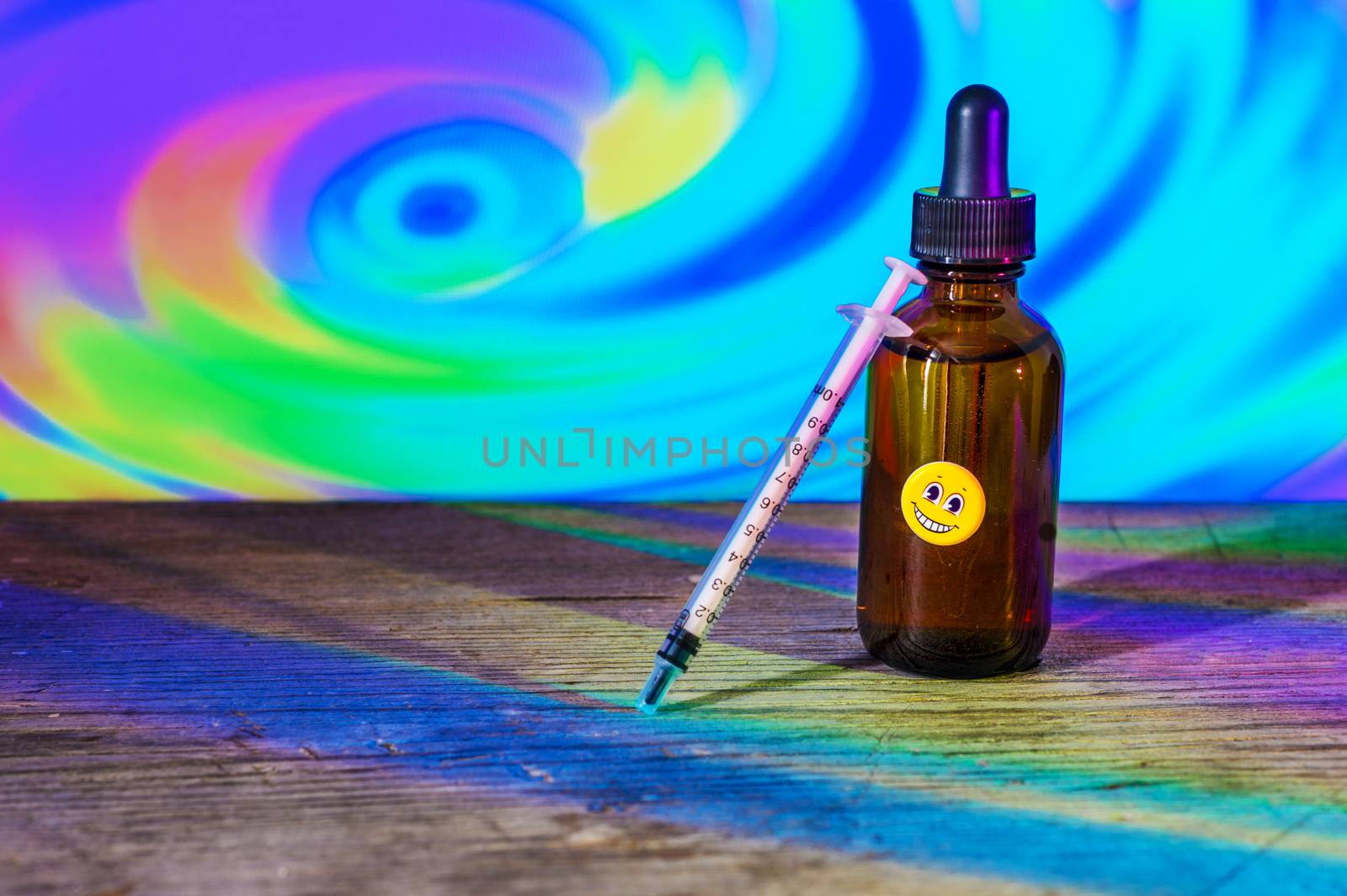 Conceptual image of a bottle of diluted LSD used for microdosing