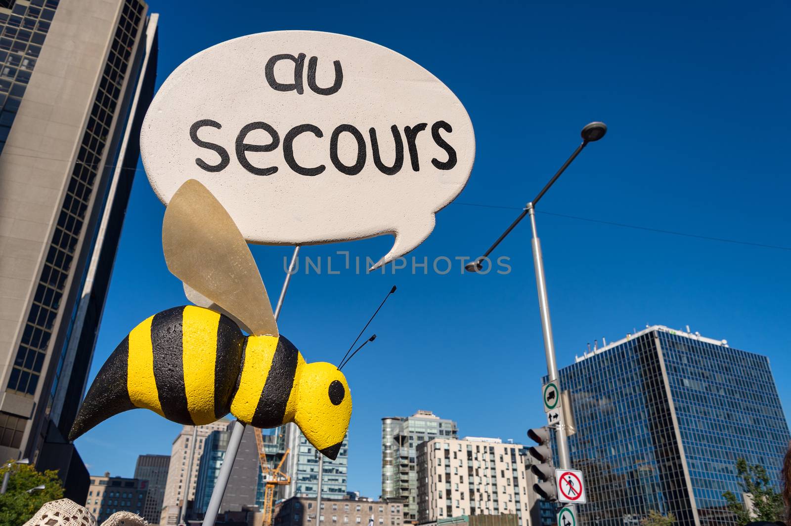 Fake Bee with Au Secours Sign by mbruxelle