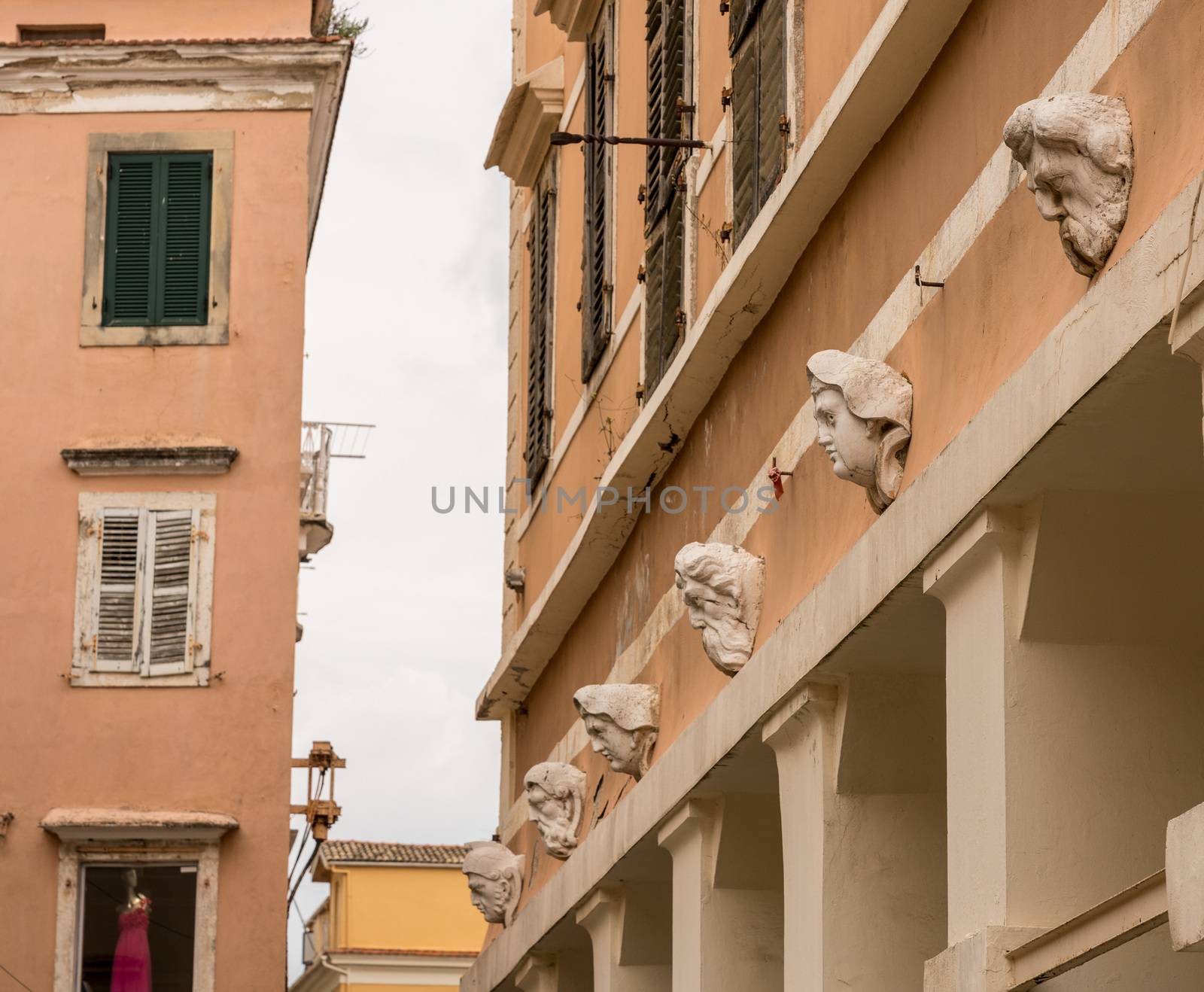 Carvings and sculptures of heads on Bazaar in Old Town in Kerkyra