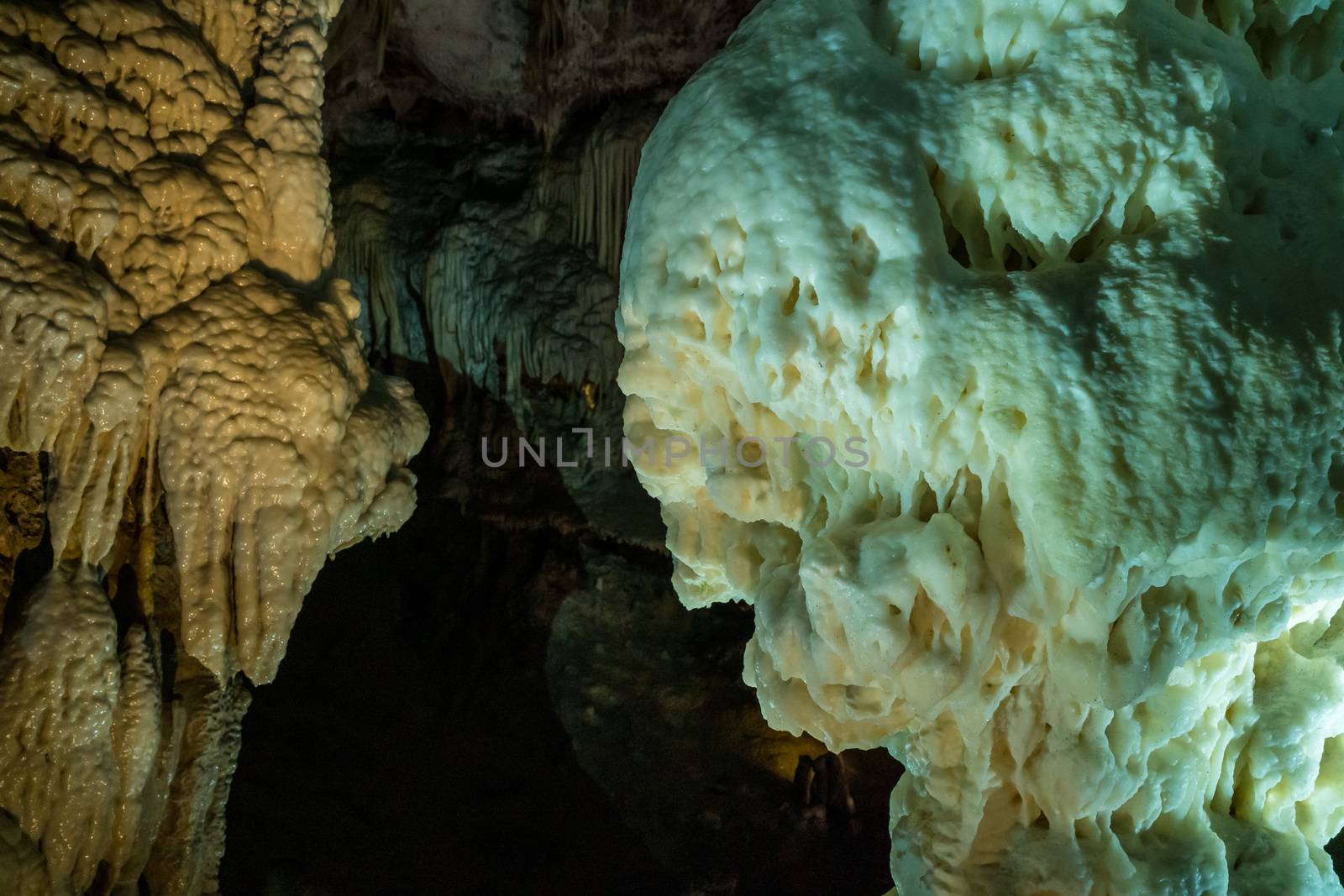 Stalactites and stalagmites underground in cave system in Postojna