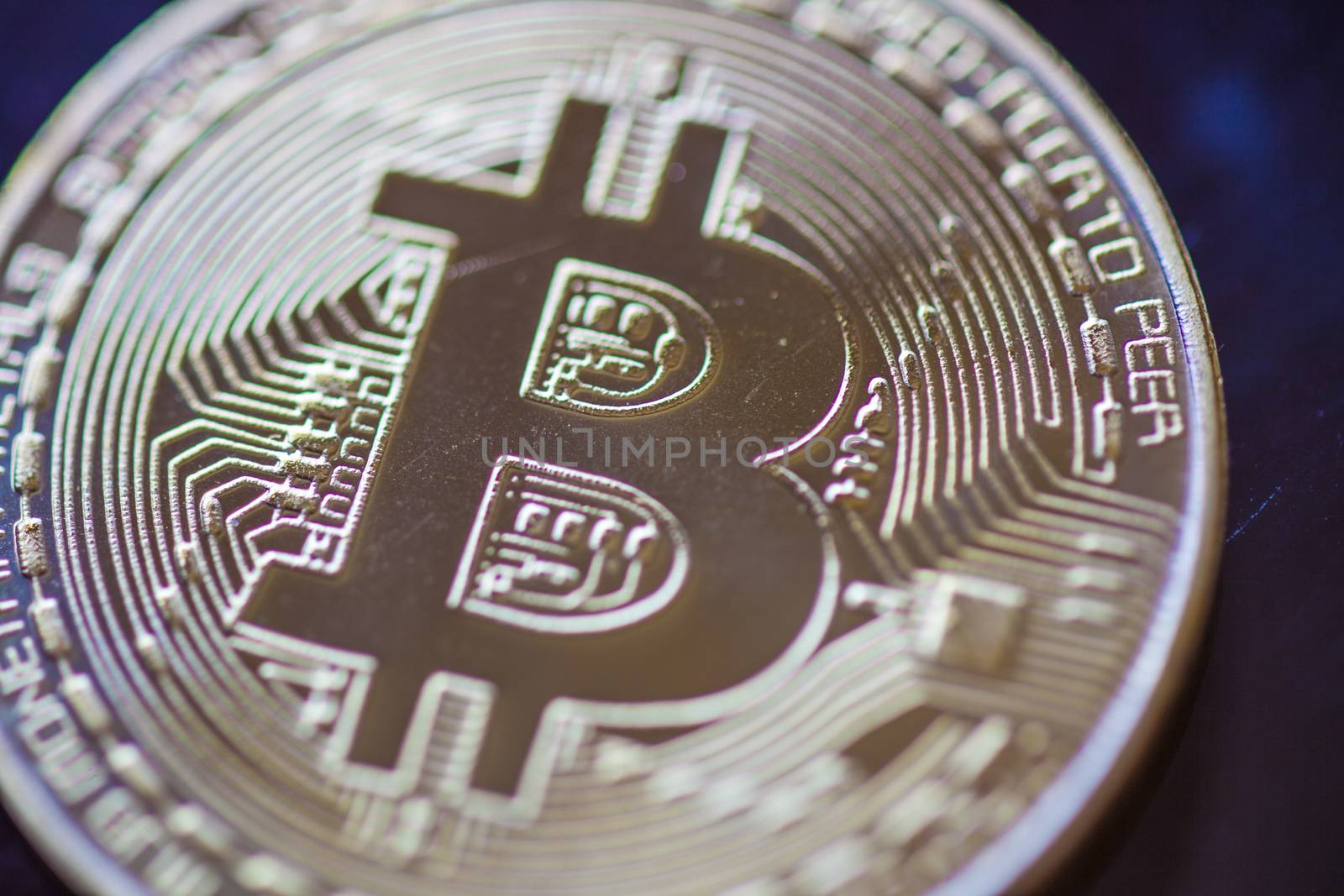 Bitcoin currency coin extreme close-up by adamr