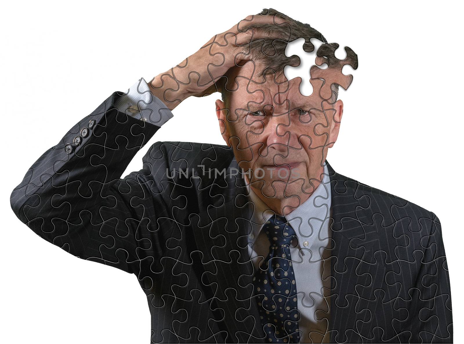 Front view and face of senior caucasian man afraid of dementia and Alzheimer's disease using jigsaw concept