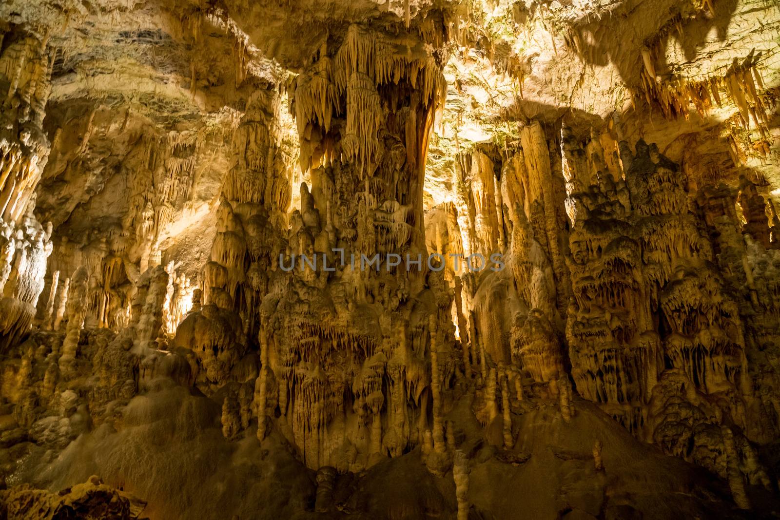 Stalactites and stalagmites underground in cave system in Postojna