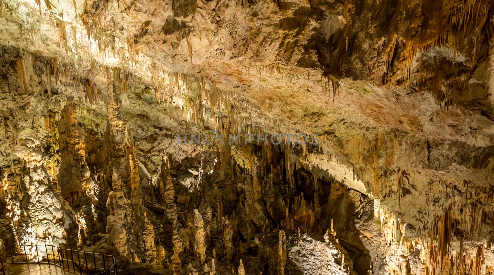 Stalactites and stalagmites underground in cave system in Postojna
