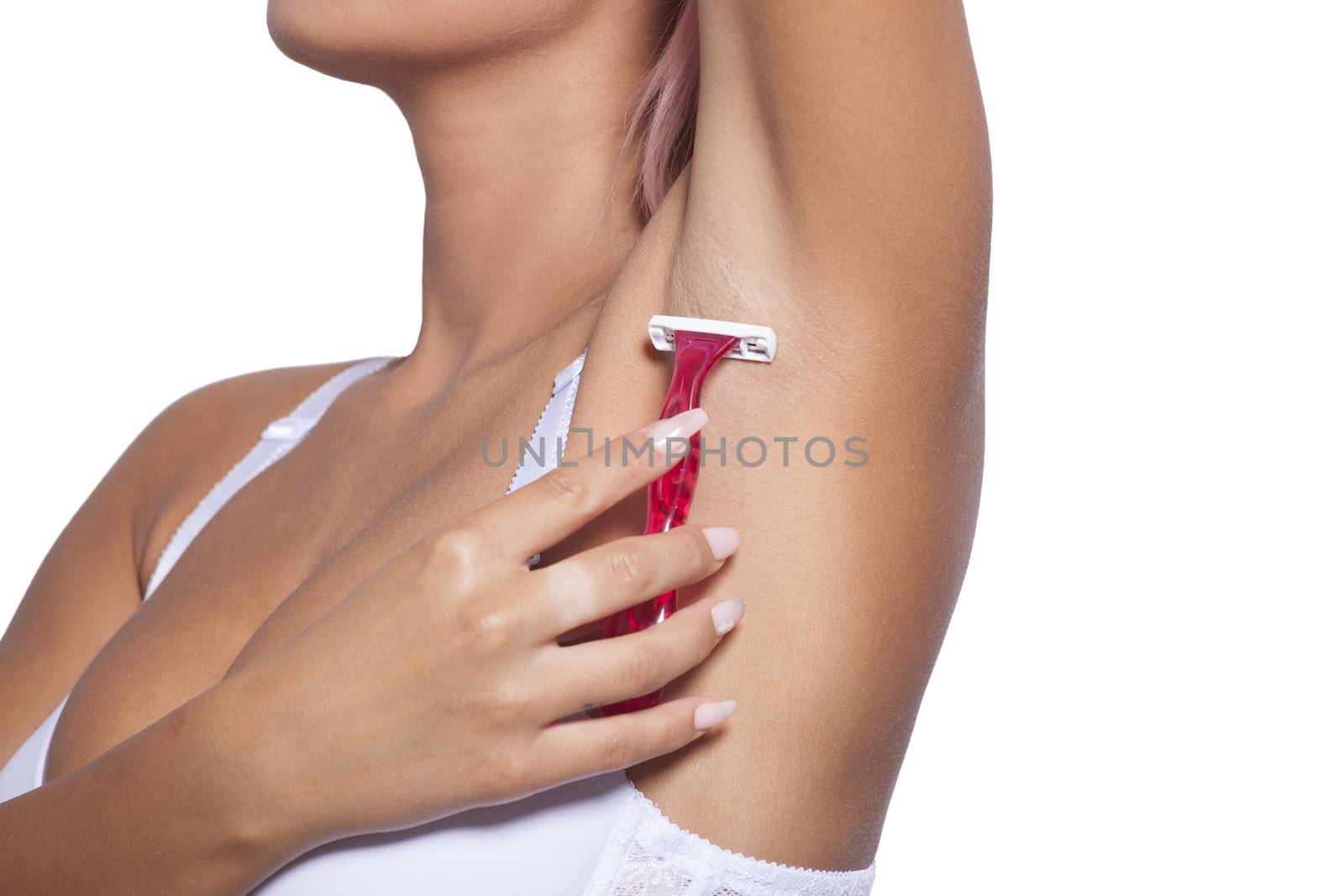 Adult woman shaving armpit with pink shaver by adamr