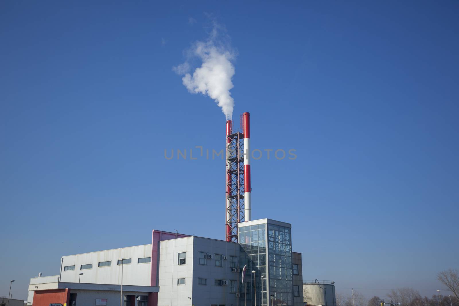 Heating plant - powerhouse and chimey with smoke by adamr