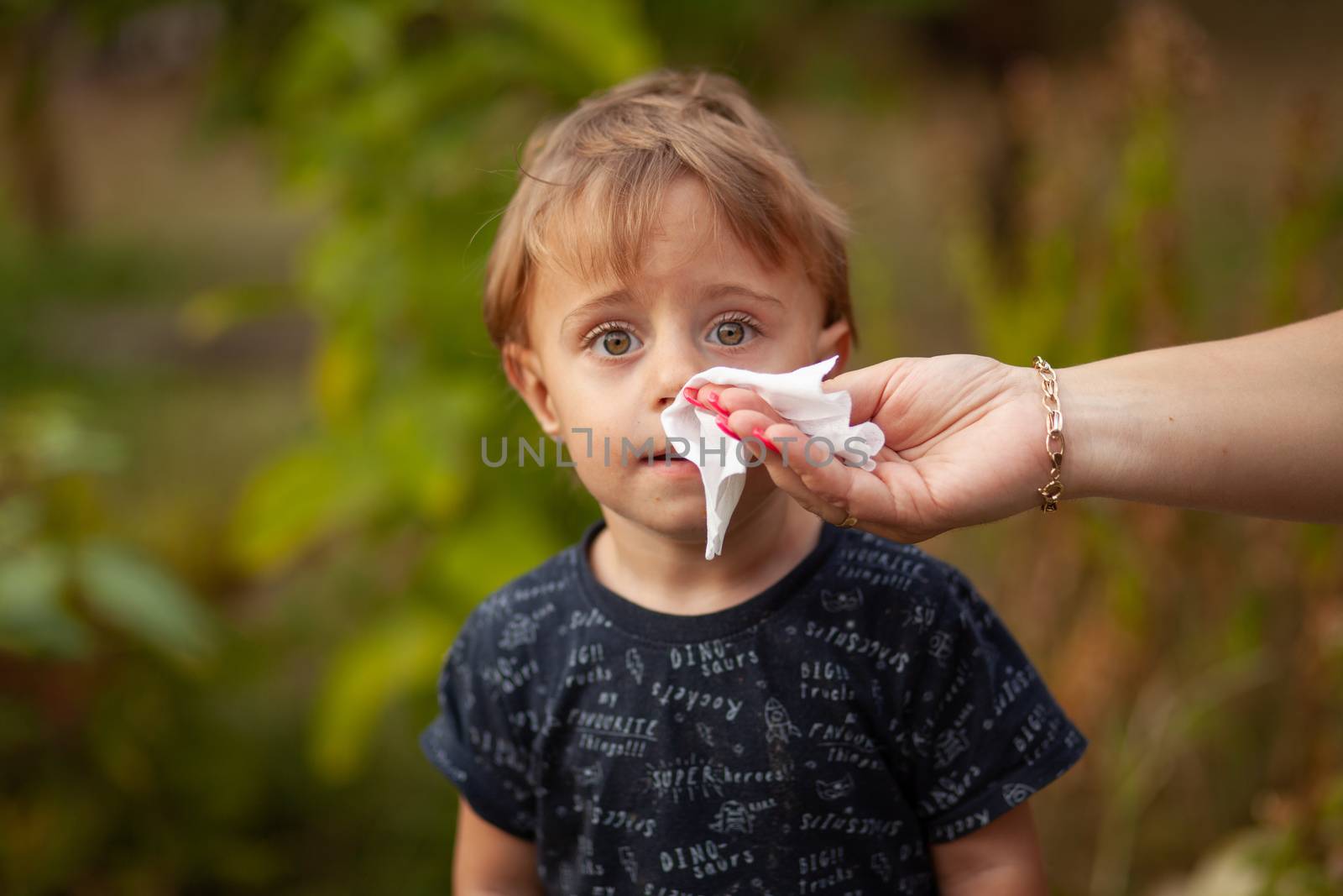 Cleaning baby face and skin with wet wipes by adamr