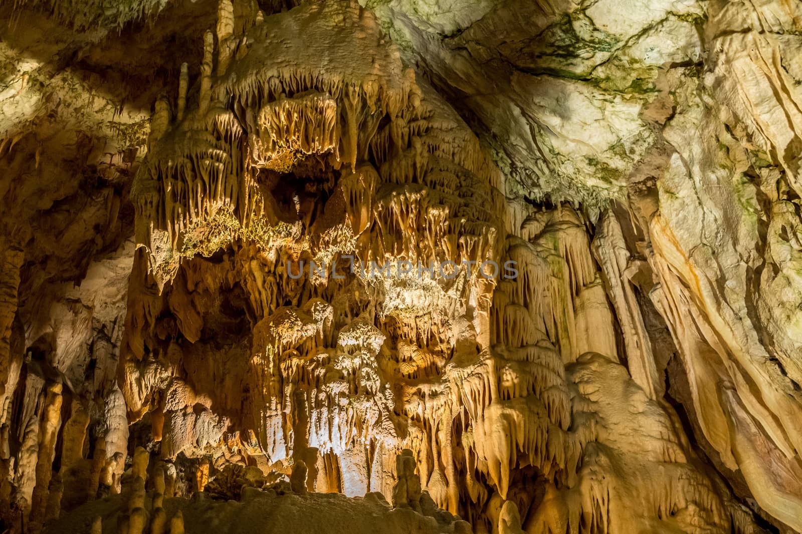 Stalactites and stalagmites underground in cave system in Postojna