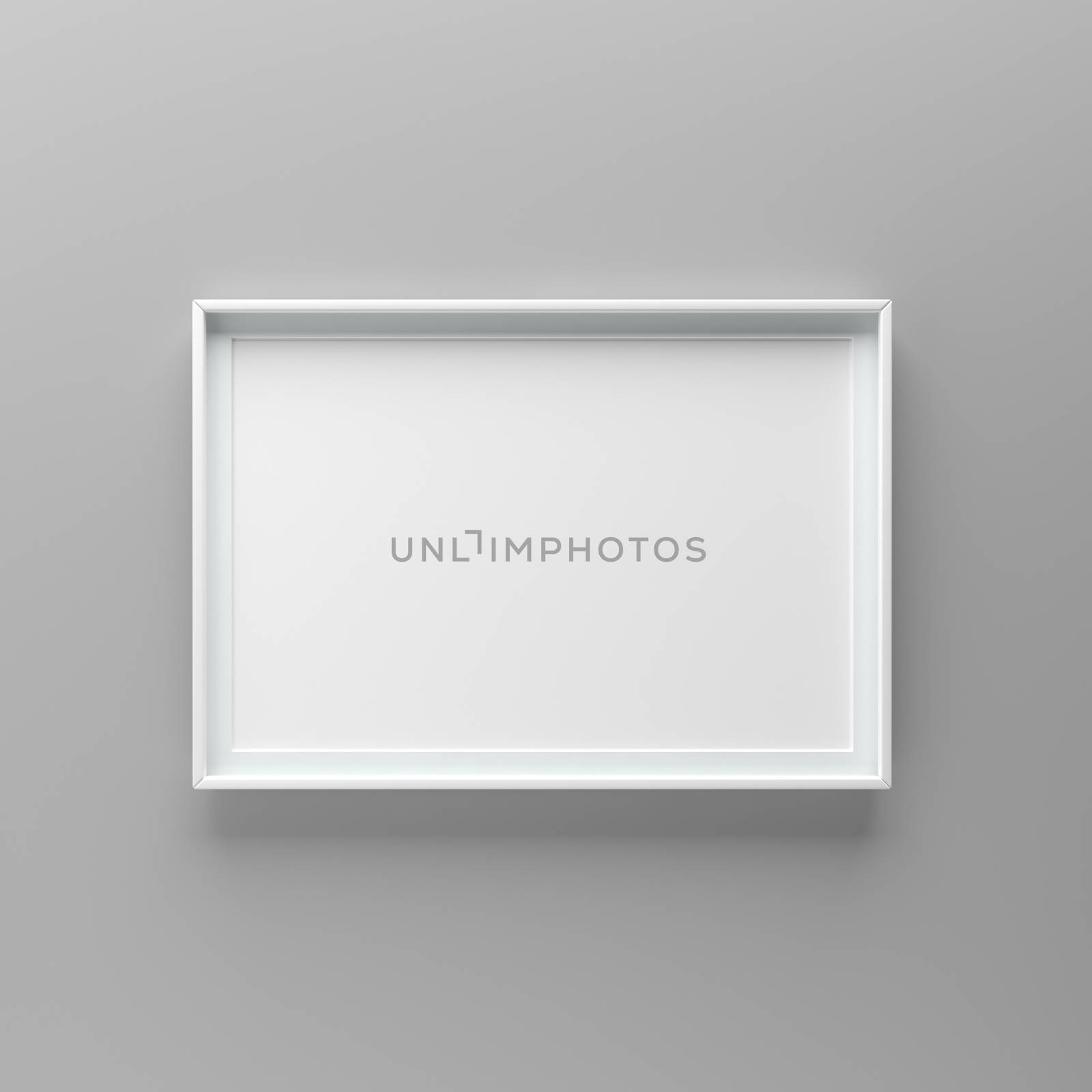 Elegant and minimalistic picture frame standing on gray wall by adamr